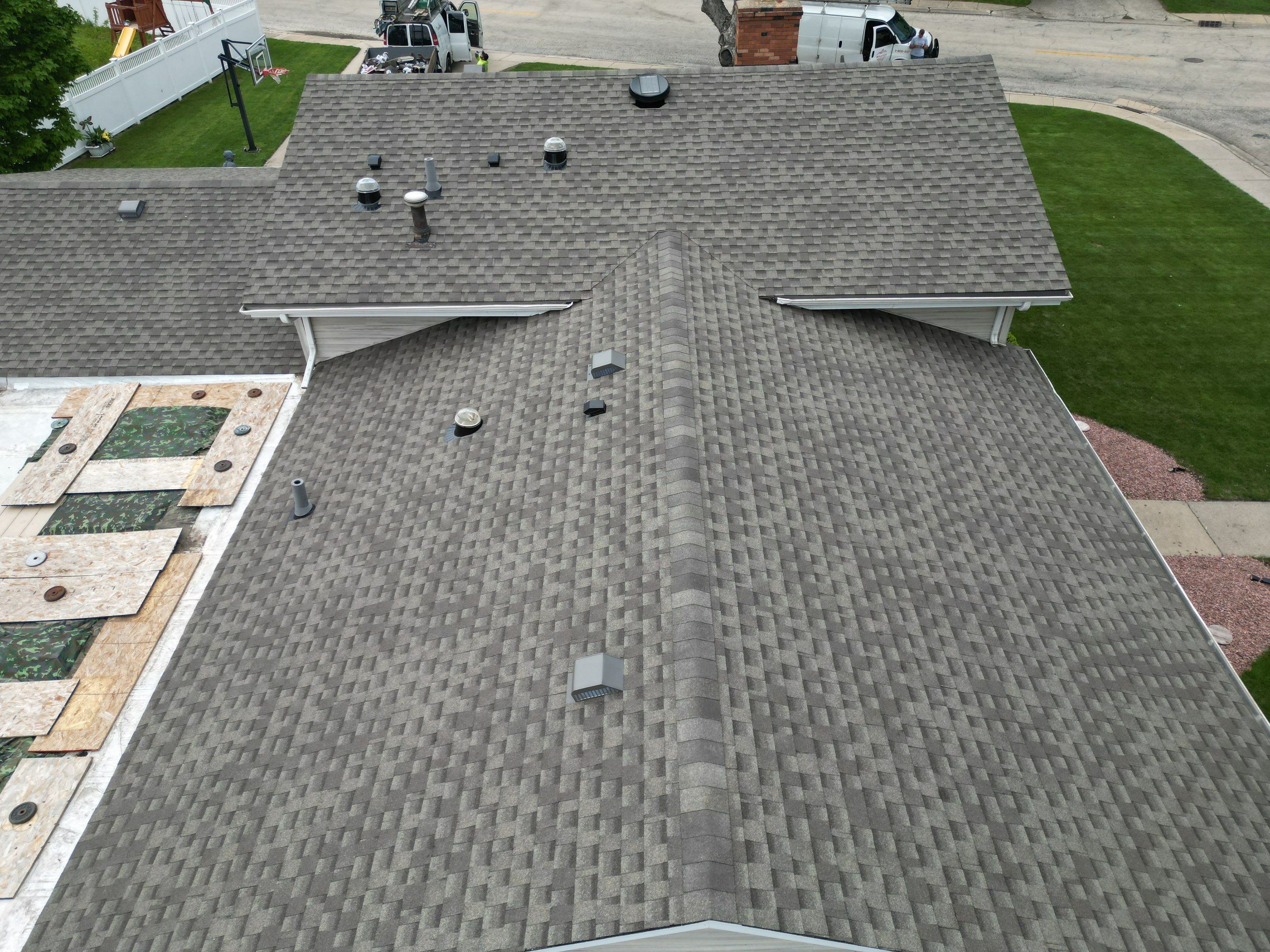 Roof, gutters, windows & siding replacement by Optimal Home Improvement 