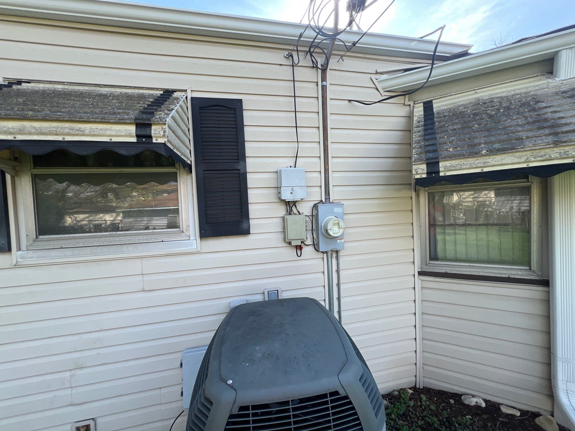Housewashing  using Algaecide, soft wash soap by Northern Power Washing LLC.