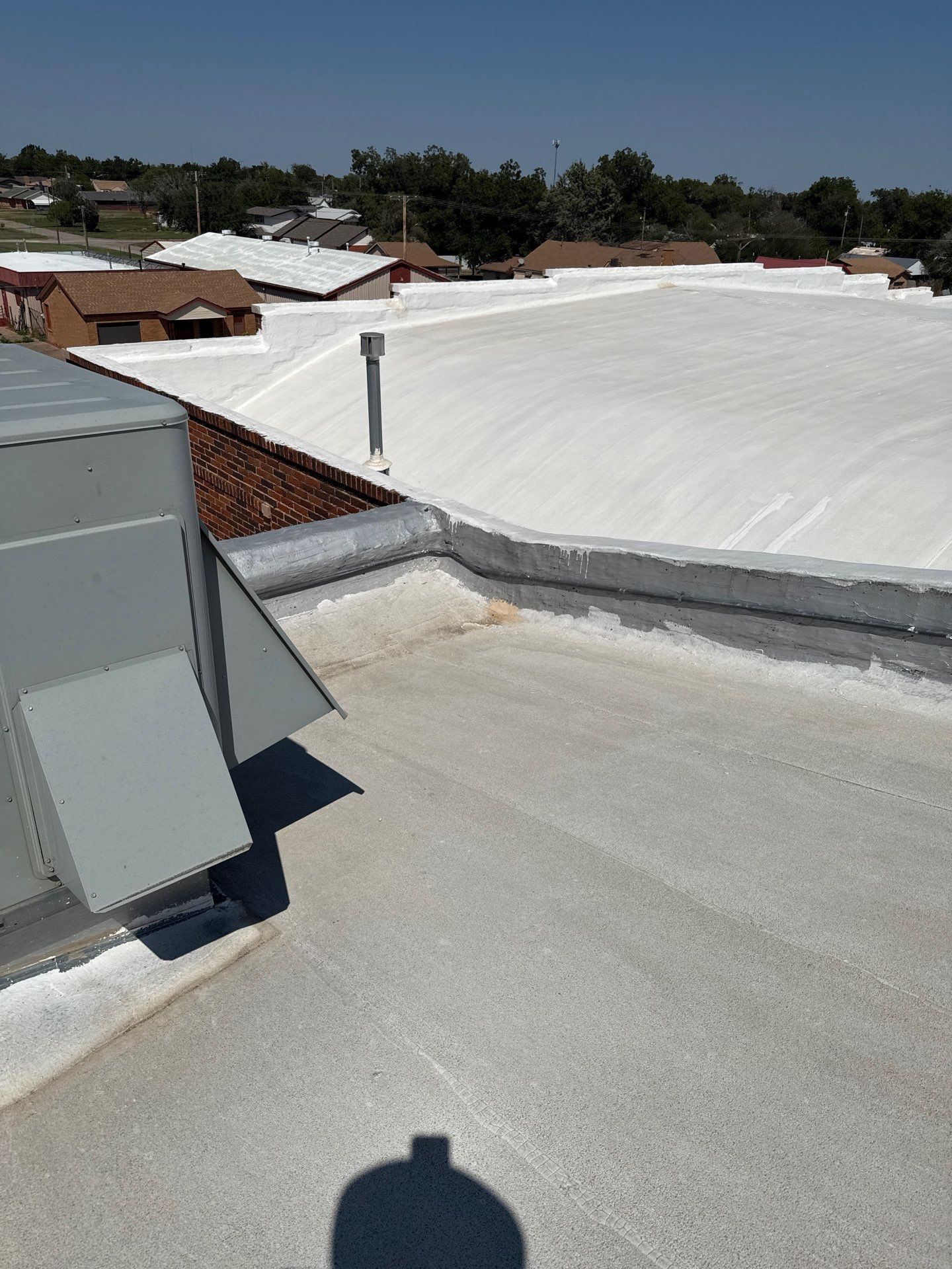 Hollis High School Comprehensive TPO Roof Replacement and Restoration by Secondary Rhodes