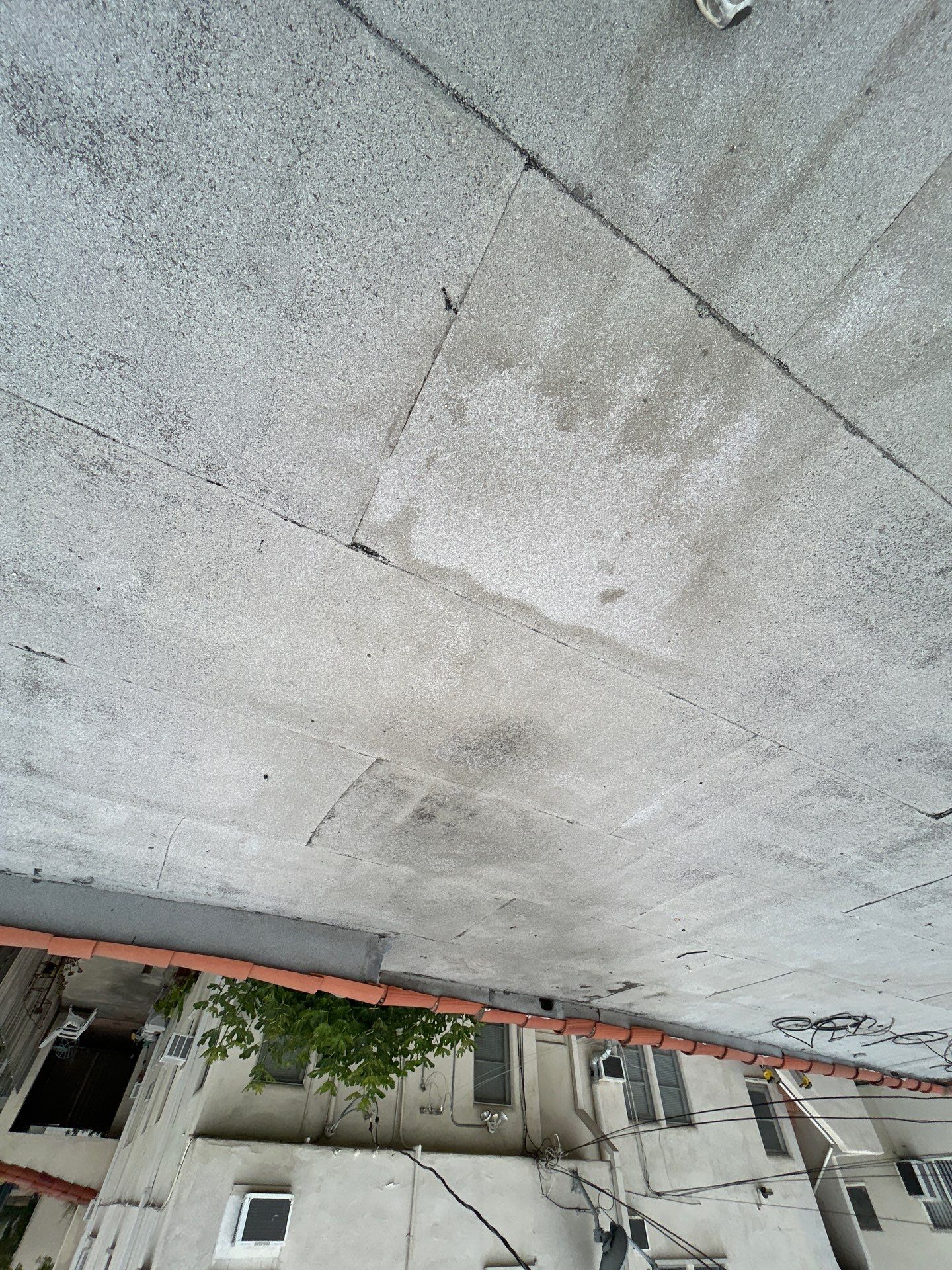 Beverly Hills Flat Roof Coating and Terracotta Tile Reset by Hull Brothers Roofing