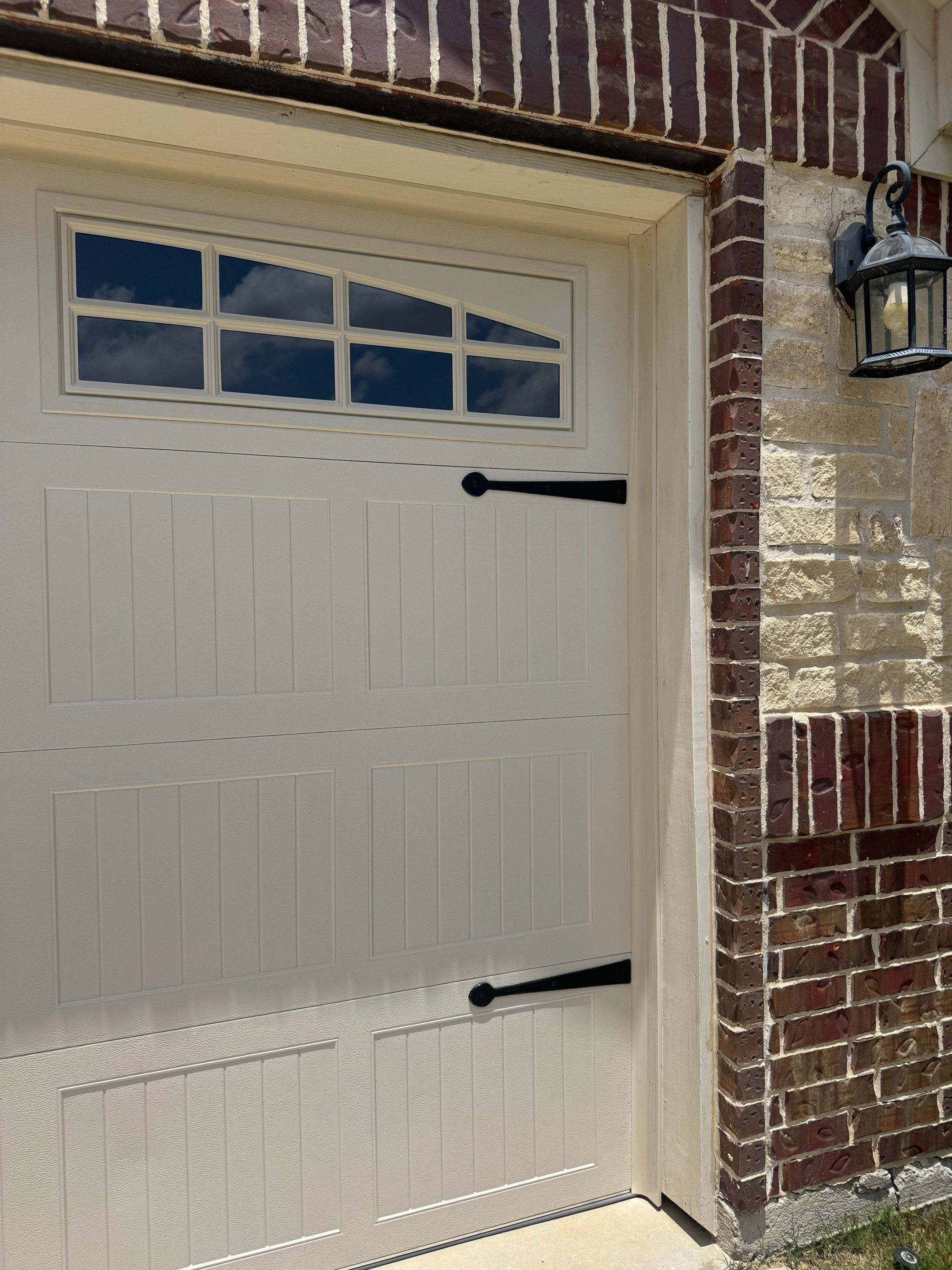 CHI Carriage Stamp Garage Door Installation With Decorative Hardware In Roanoke by Meadows Garage Doors