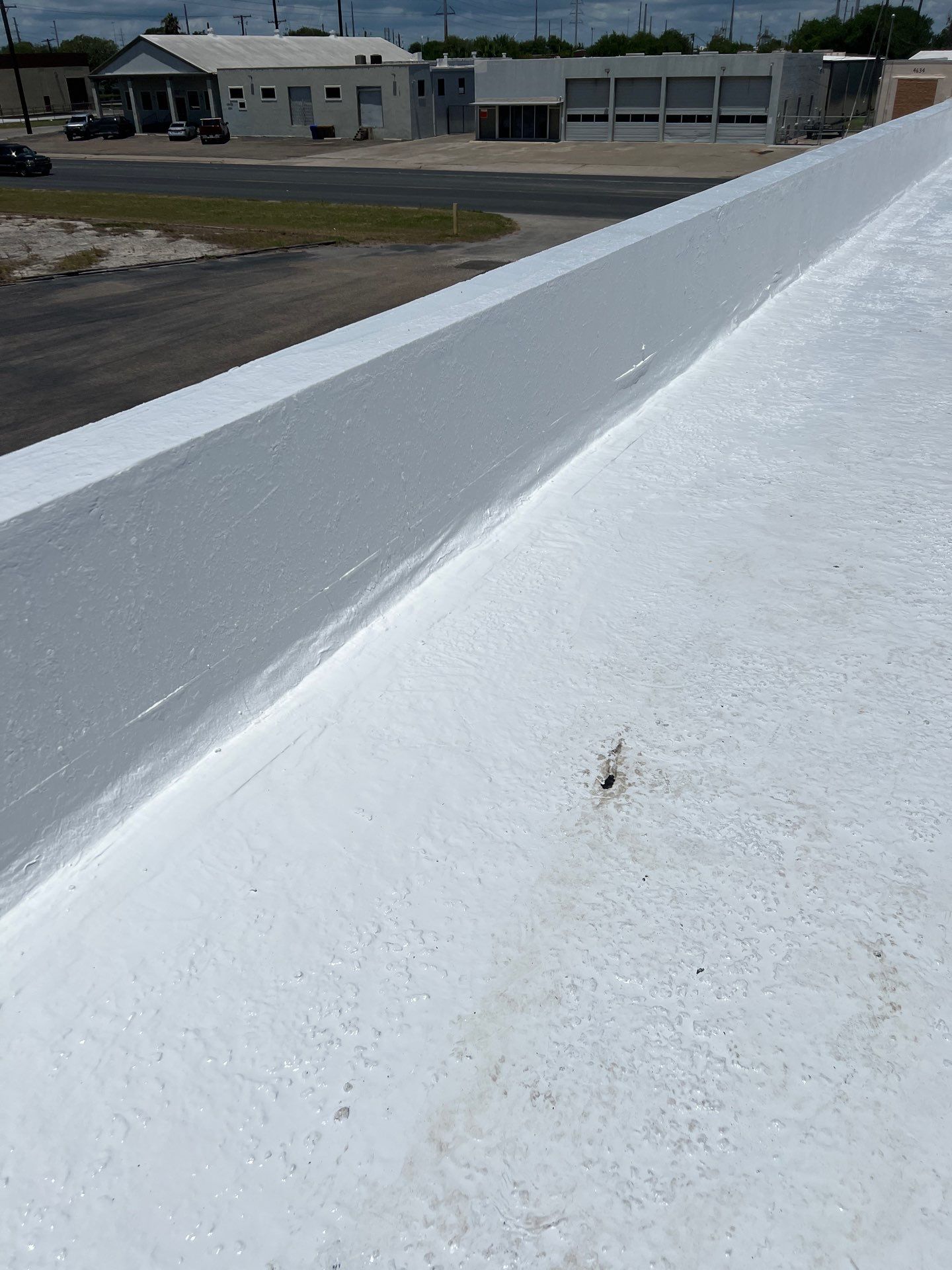 Dirty leaking Gravel Roof by Bayfront Roofing and Construction