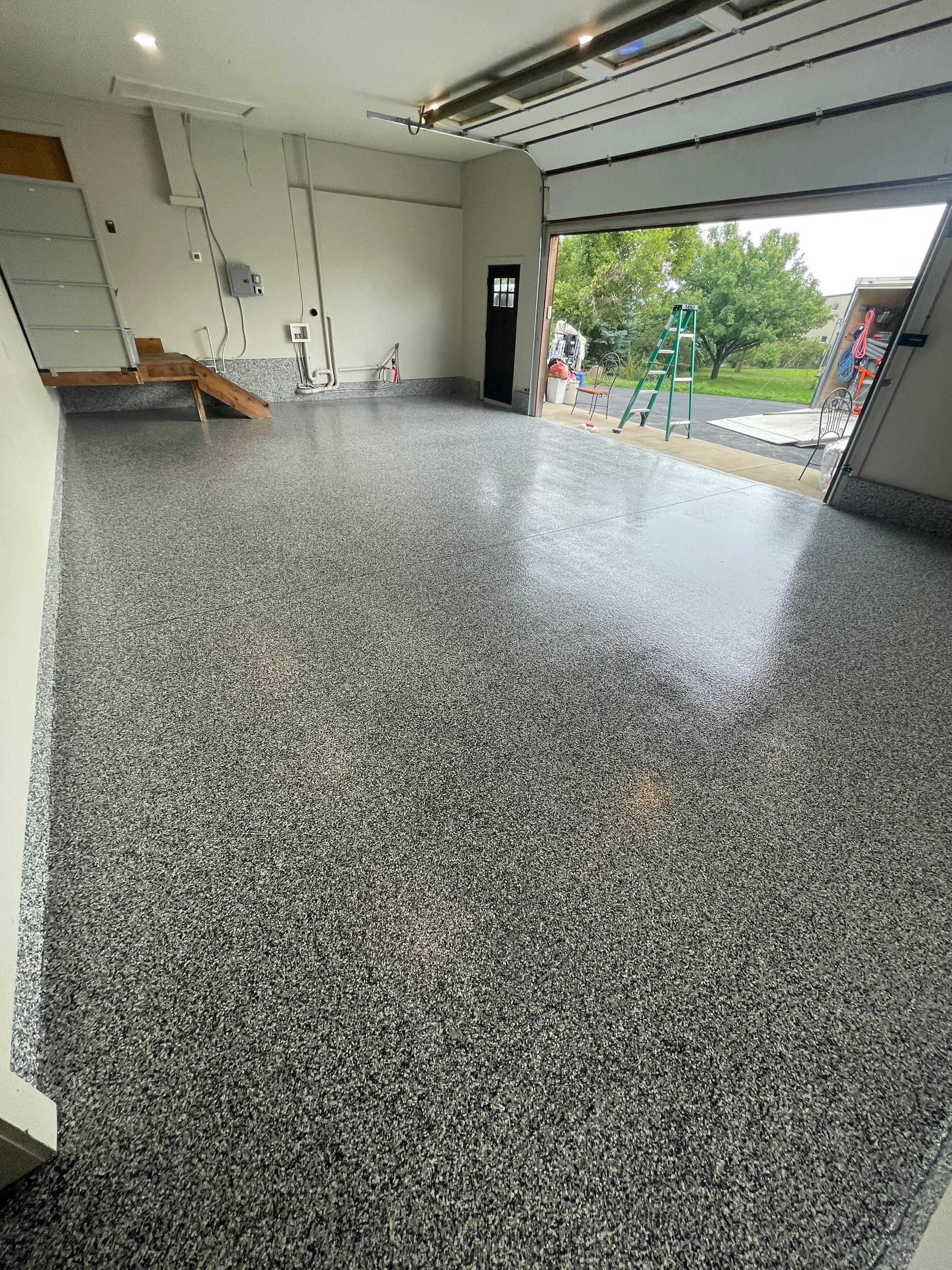 Domino Flake Floor Coating and Crack Repair in Chancellor by Select Painting, Coatings & Garage Cabinets