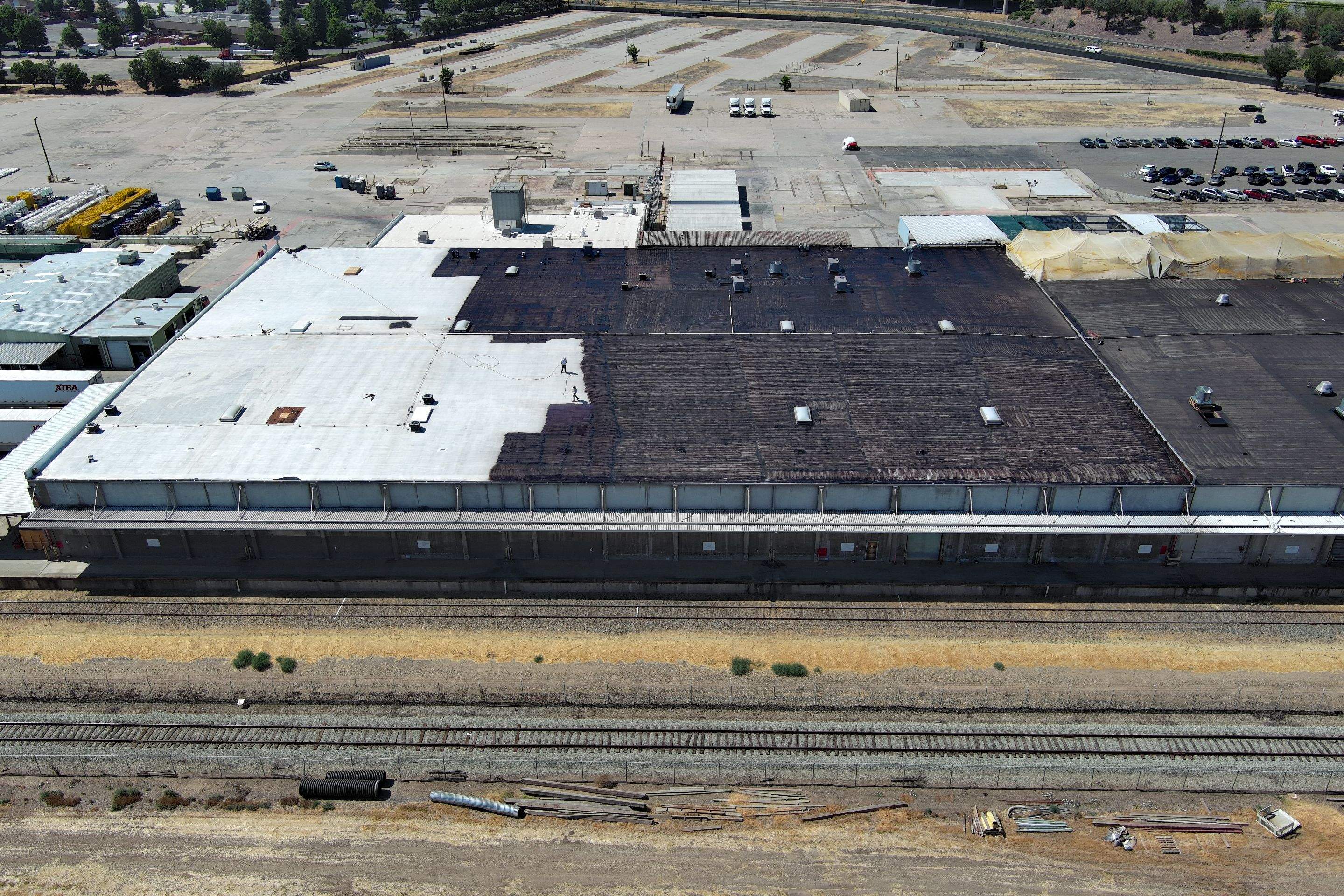 Pro Farms Spray foam roofing project by Straight Edge Roofing Inc