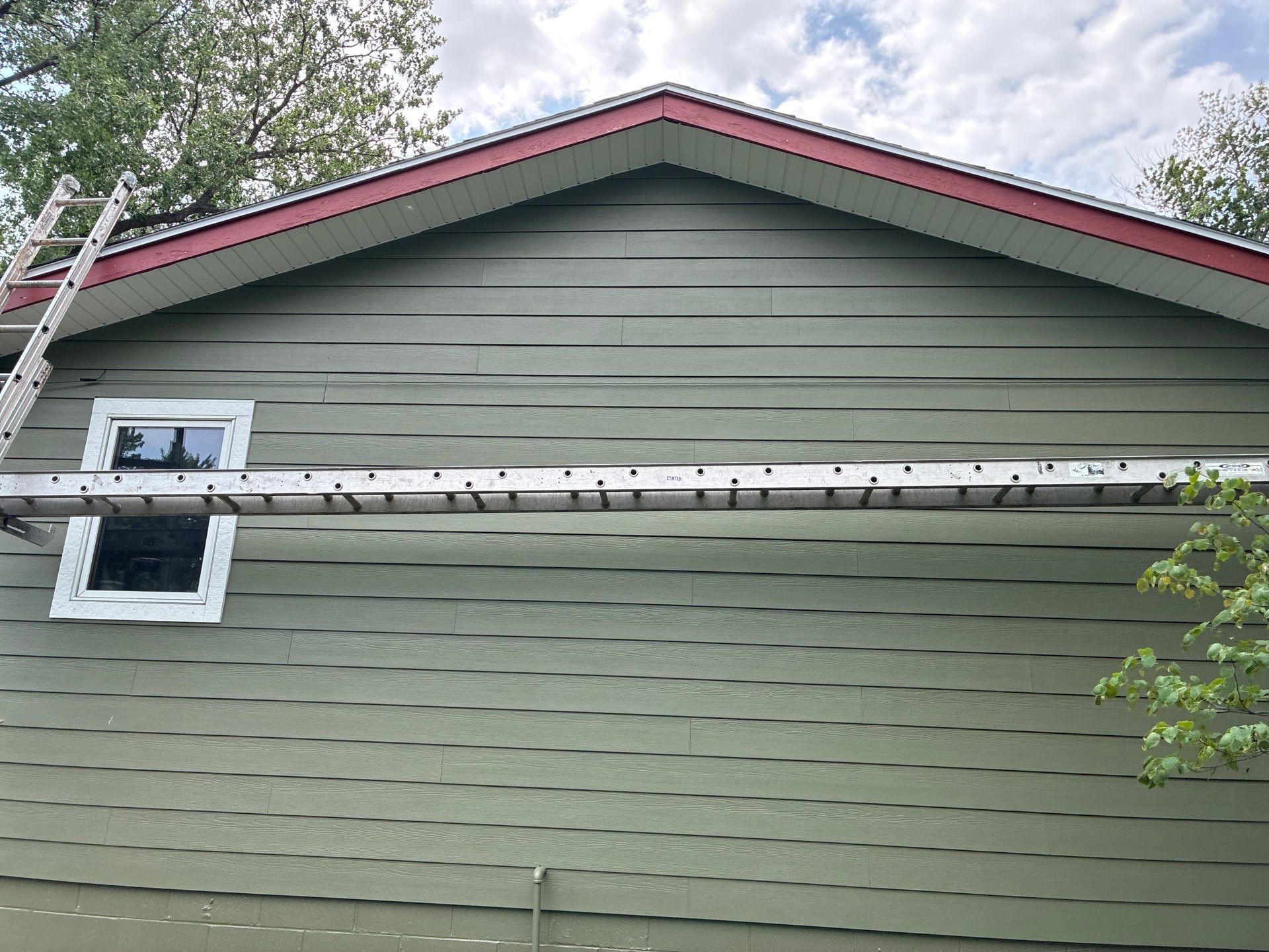 James Hardie Siding Replacement in Omaha with Mountain Sage Finish by Carps Complete Exteriors