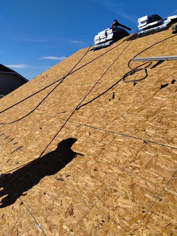 Residential Roofing Installation using Atlas Pinnacle Pristine Black Architectural Shingles by Frederick Roof Repair