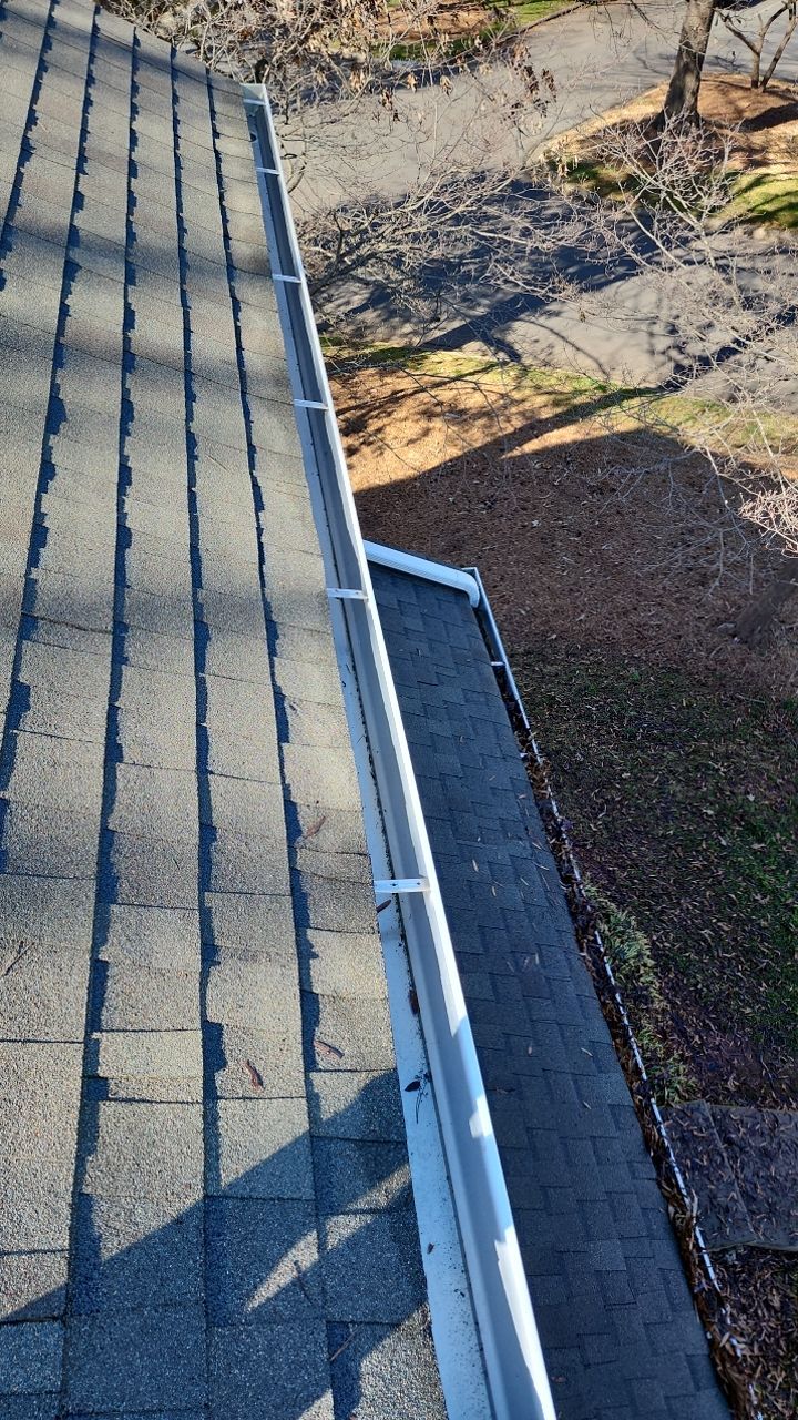 Gutter Cleaning using water by Power Wash Masters LLC