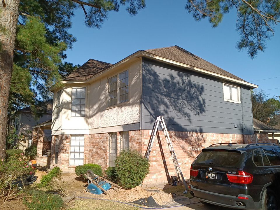 Interior and exterior painting project by Roof Concepts Construction
