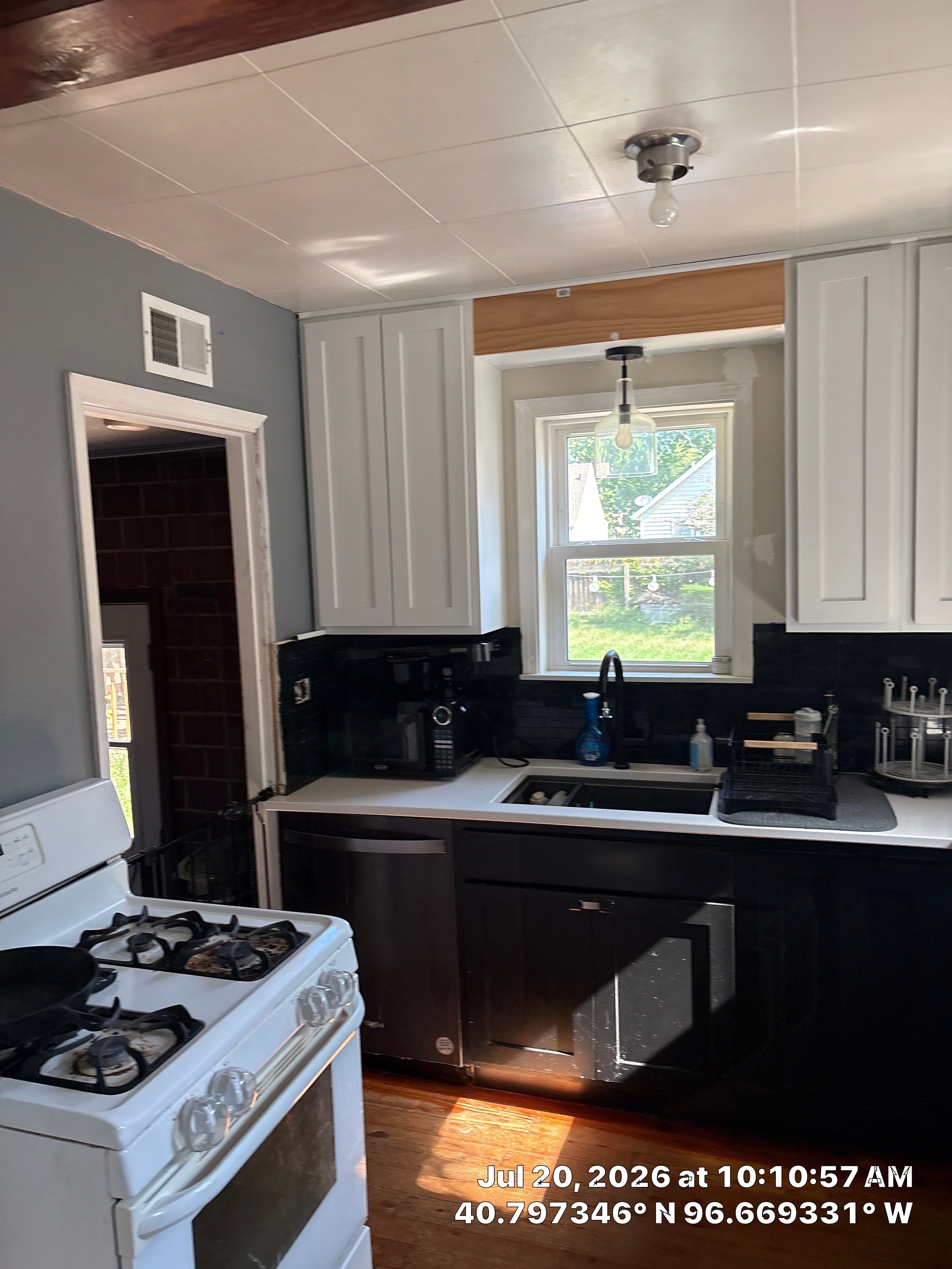 Modern Kitchen Remodel with Two-Tone Cabinetry in Lincoln by CompanyCam Sales Demo