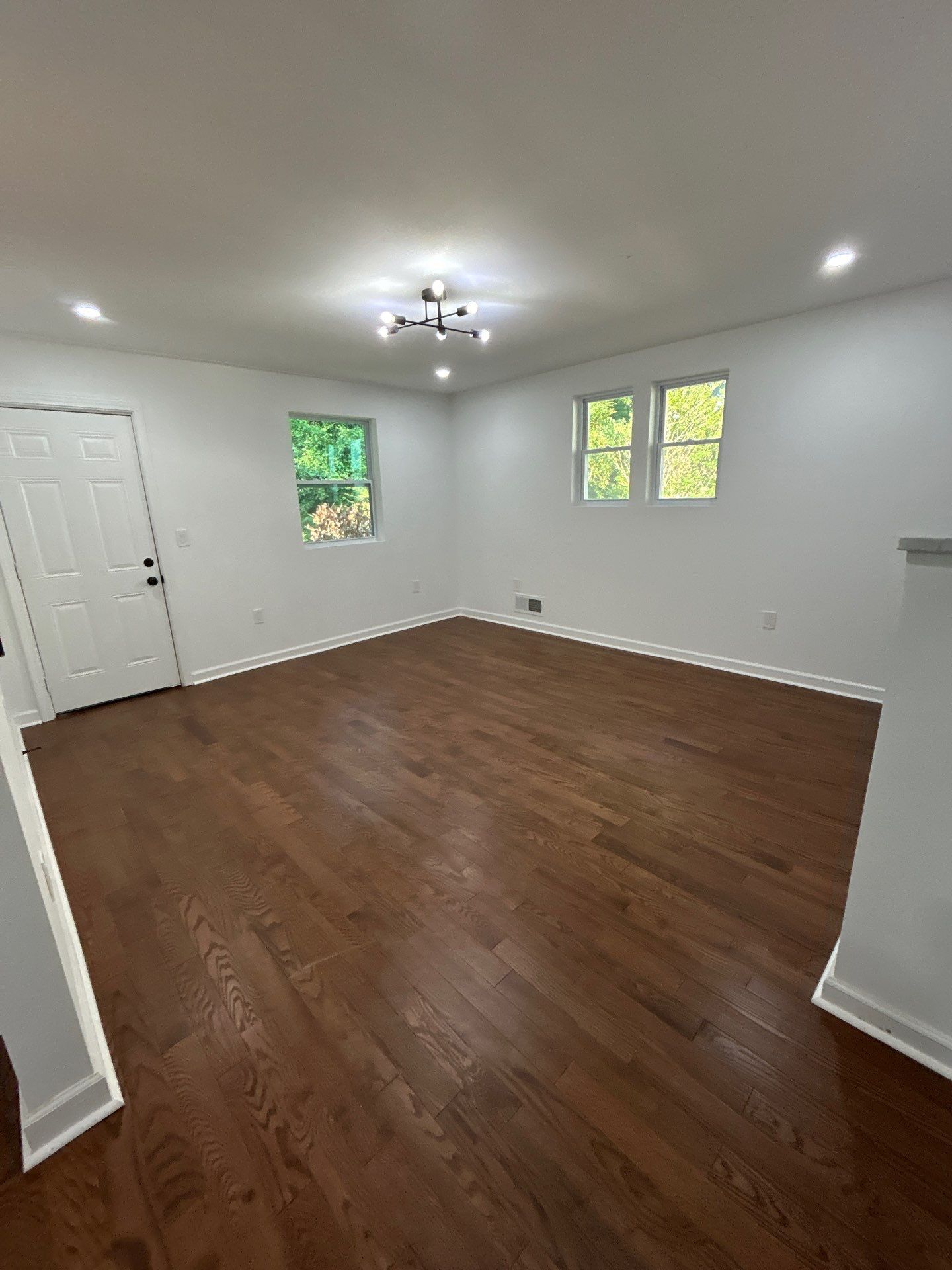 Replaced LVP with timeless solid oak by Footprints Floors of East Atlanta