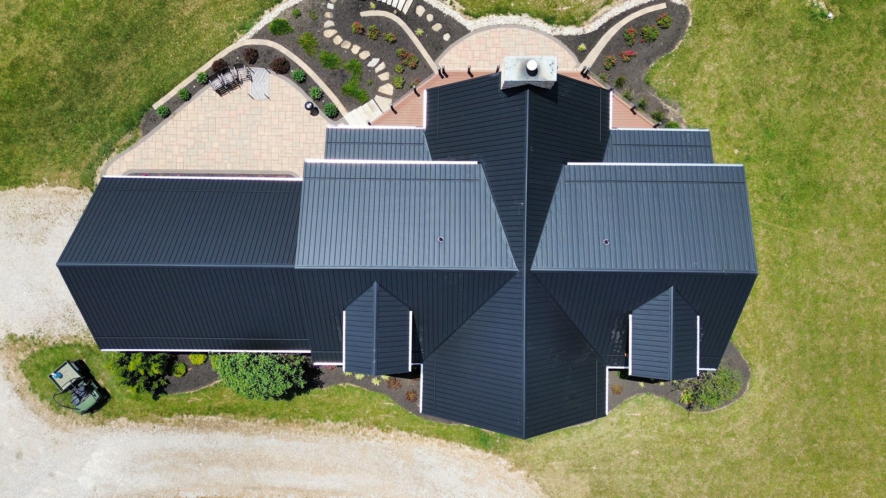 Residential Roofing Installation using Performance Panel Metal - Frost Black by RoofX 