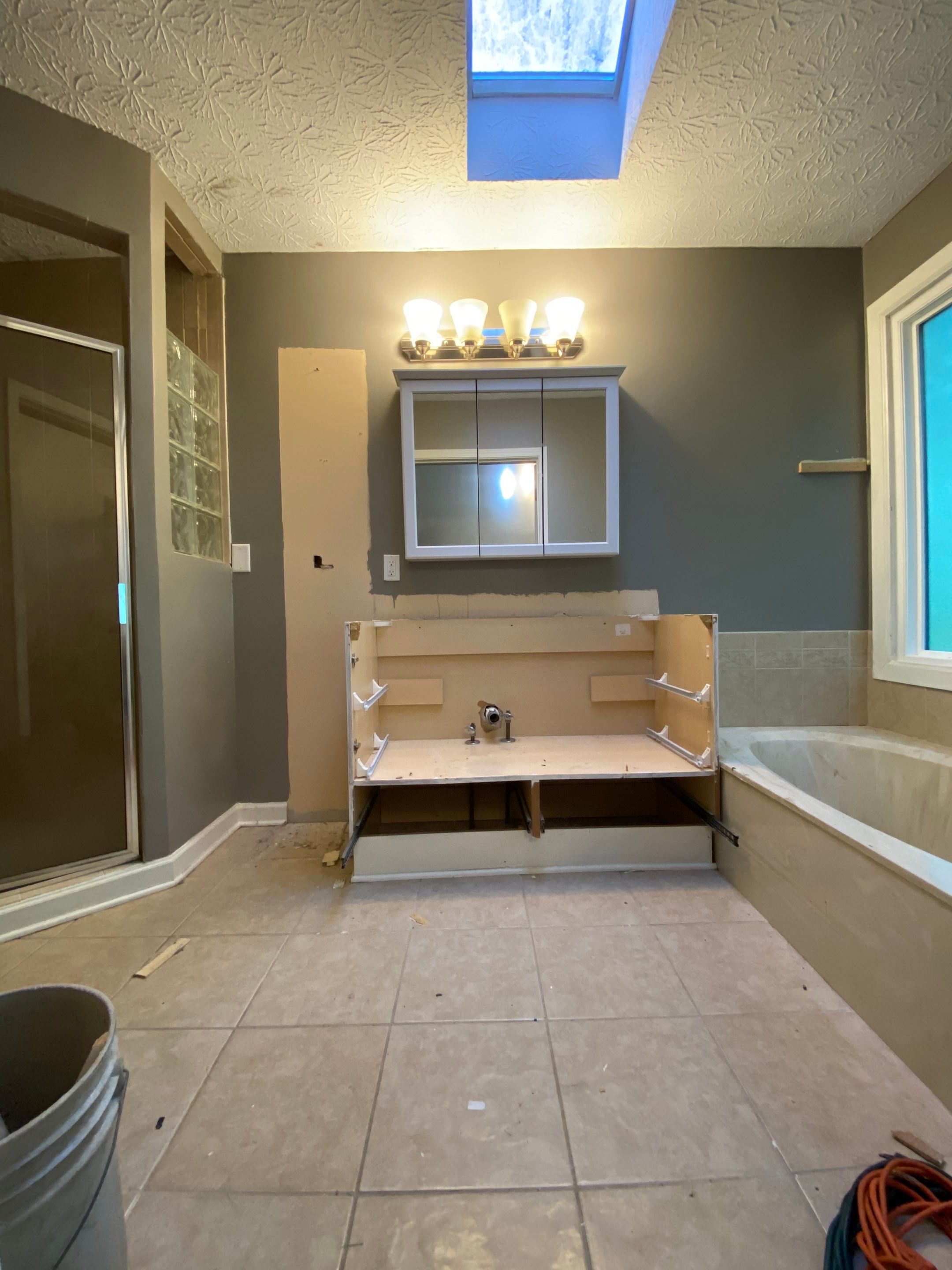 Luxury Bathroom Remodel with Marble Tiles in Kennesaw by Swift Home Renovations 