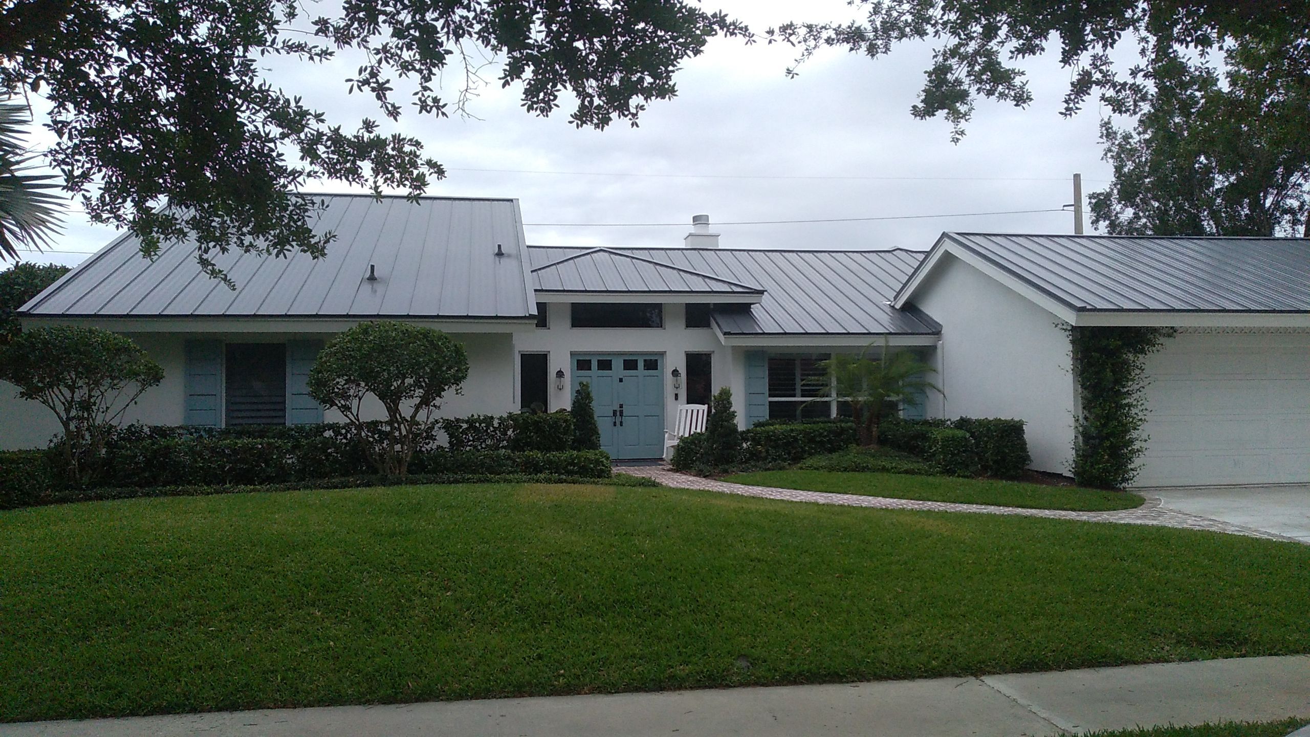 Residential Roofing Installation using 1" Nail strip metal roof by BLUES BROTHERS ROOFING