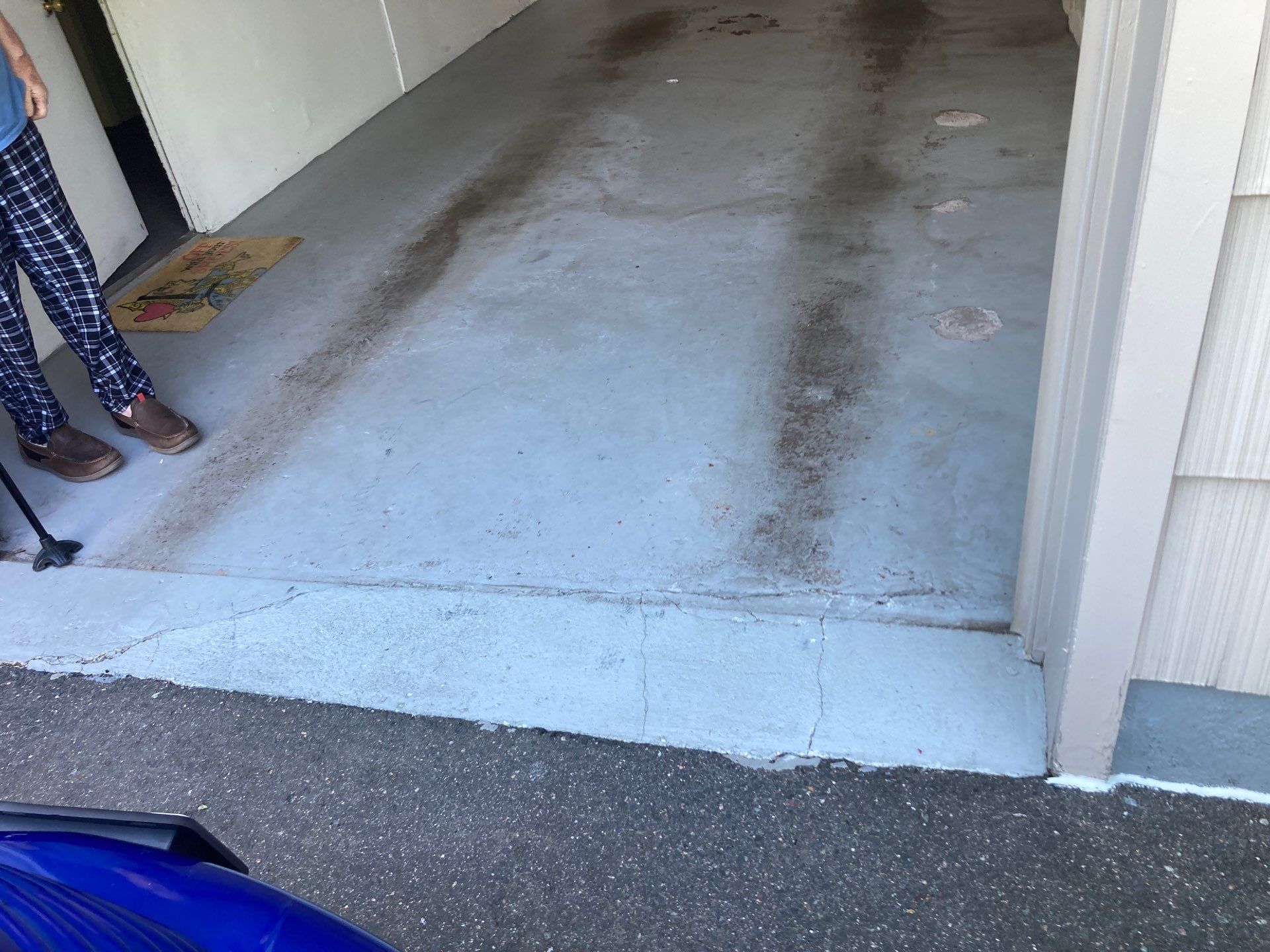 Garage Concrete Floor Coating Transformation  by DiGiorgi Roofing and Siding Inc