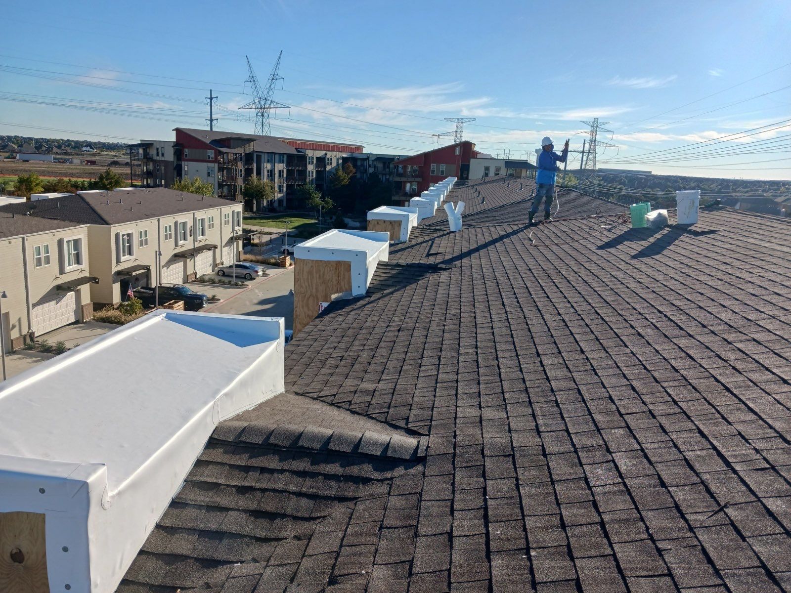 Apartment Roofing Installation using GAF HDZ Shingles, GAF TPO and Pavers in Lewisville, TX by Roof Experts