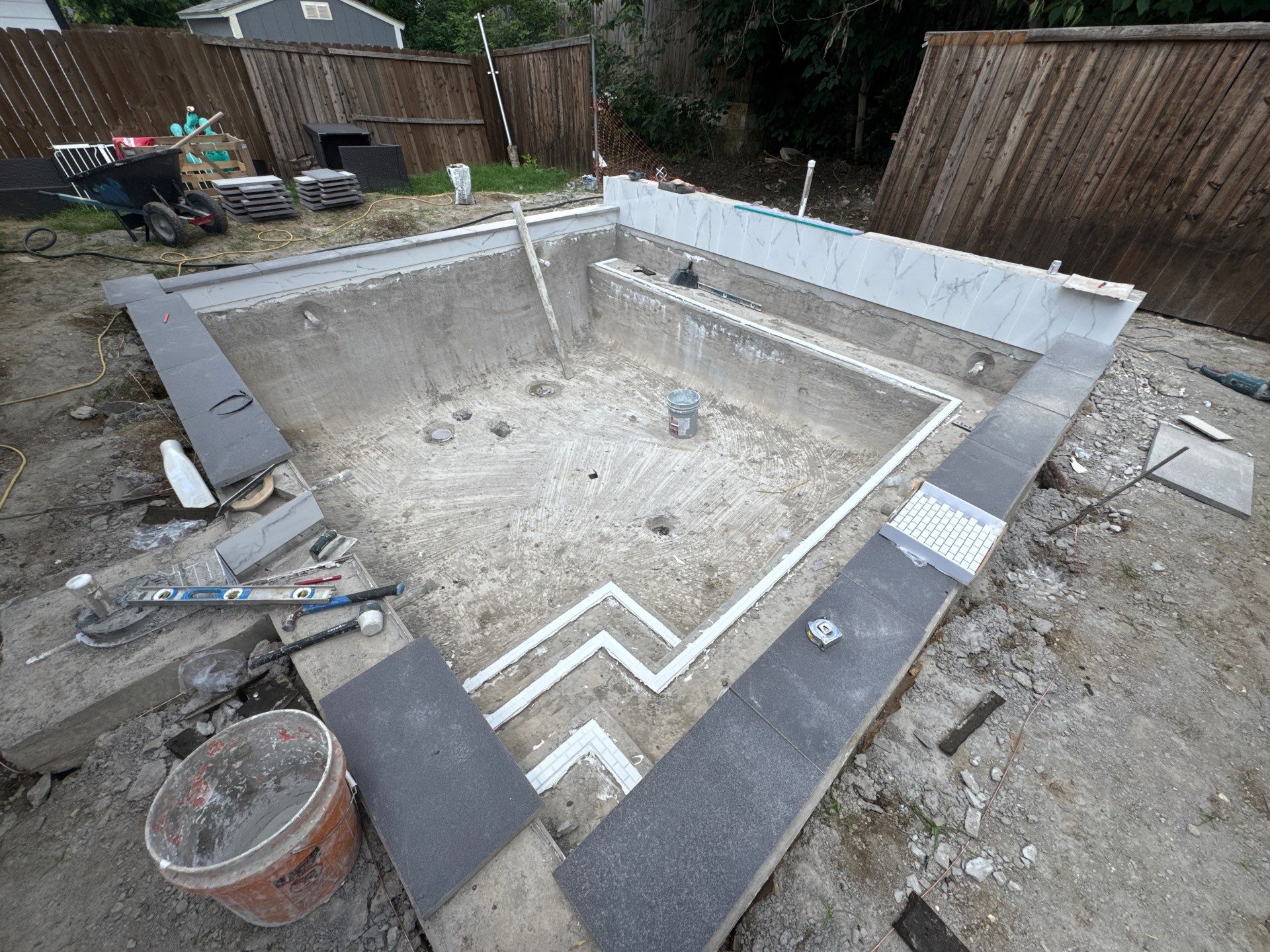 Modern Geometric Pool with Tanning Ledge and Turf by Pinnacle Pools and Spas - DFW
