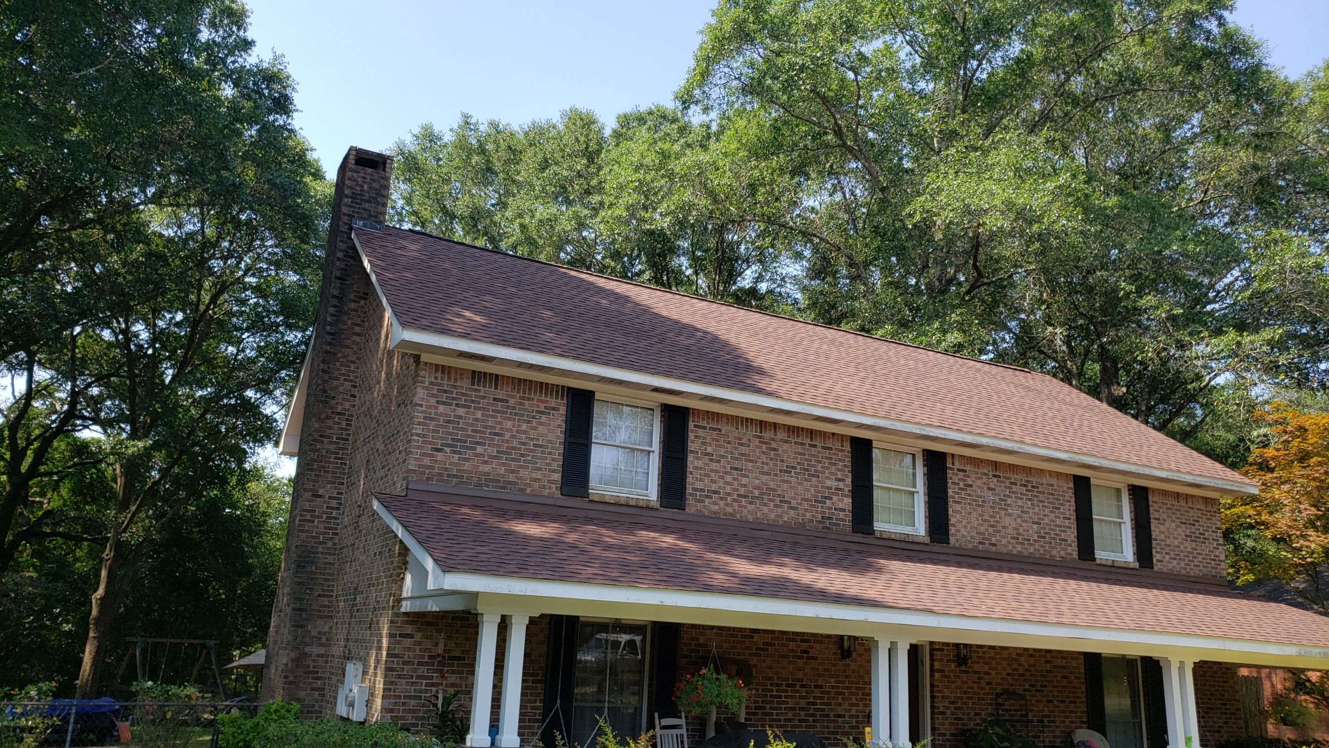 Residential Roofing Installation using Roof Replacement by American Roofing & Construction LLC