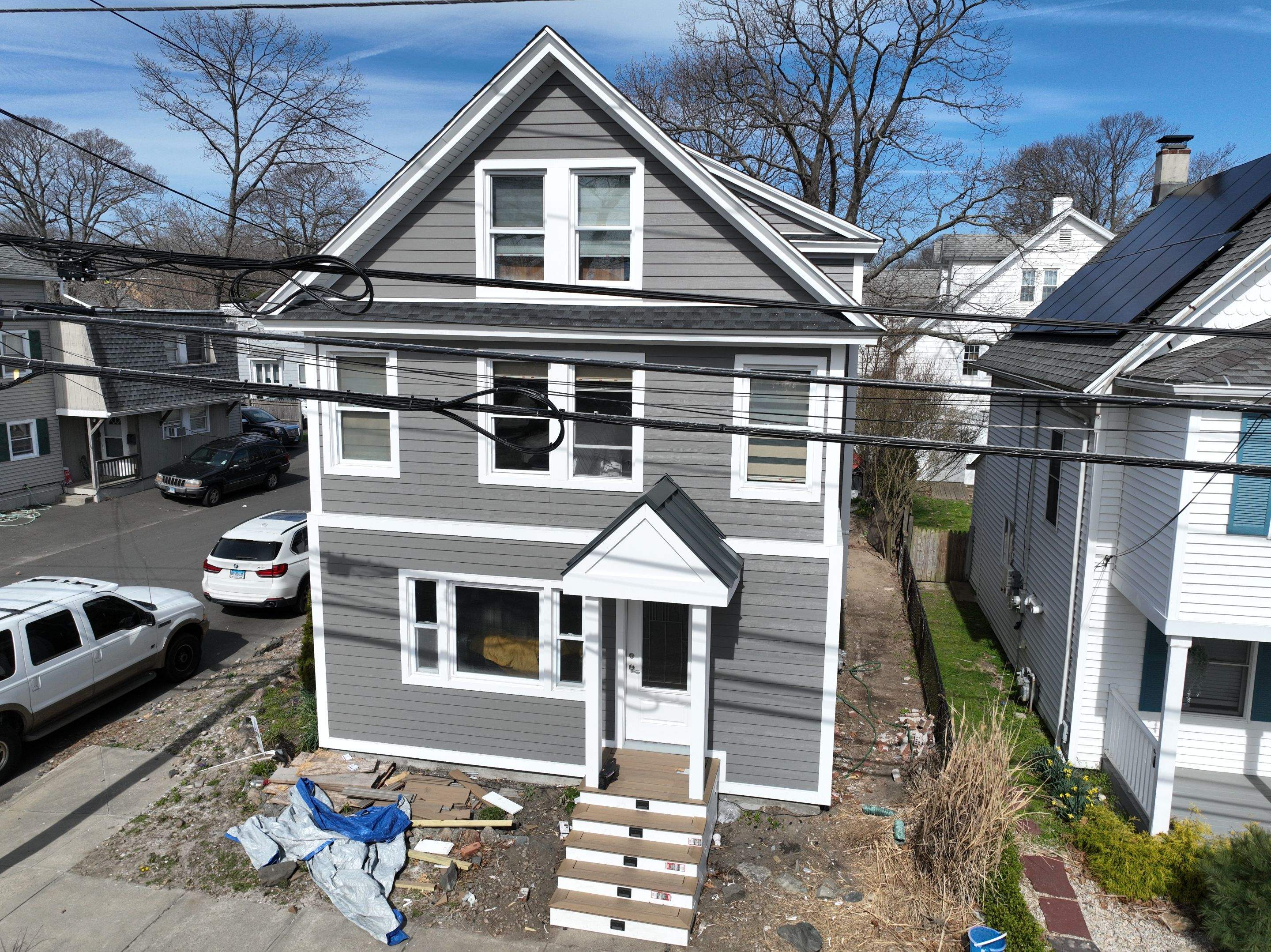 Siding Installation using Hardie Plank Aged Pewter by A Plus Exterior