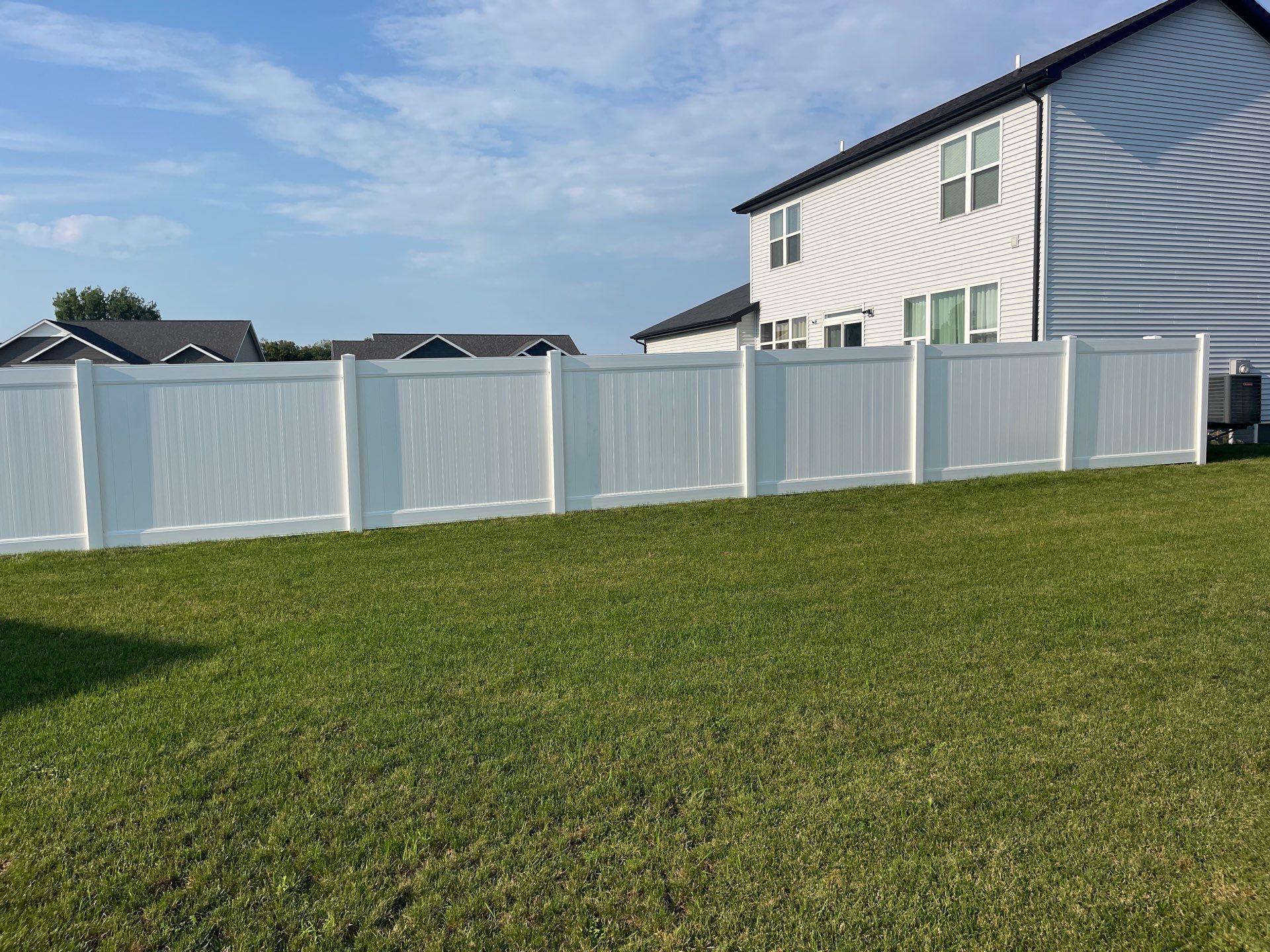 White Vinyl Privacy Fence Installation With Double Gates in Waterloo by Perfect Picket Fence and Stain