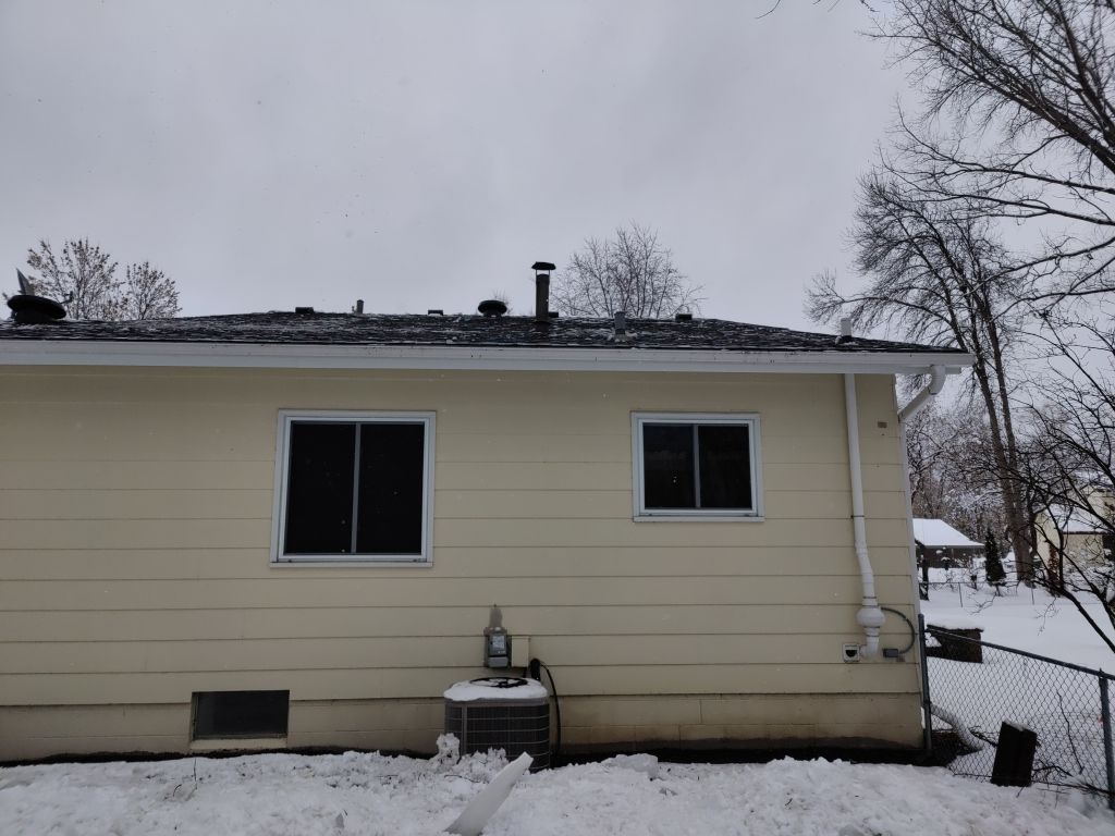 Ice Dam Steaming in Maple Grove by Next Level Seamless Gutters / Exteriors Inc.