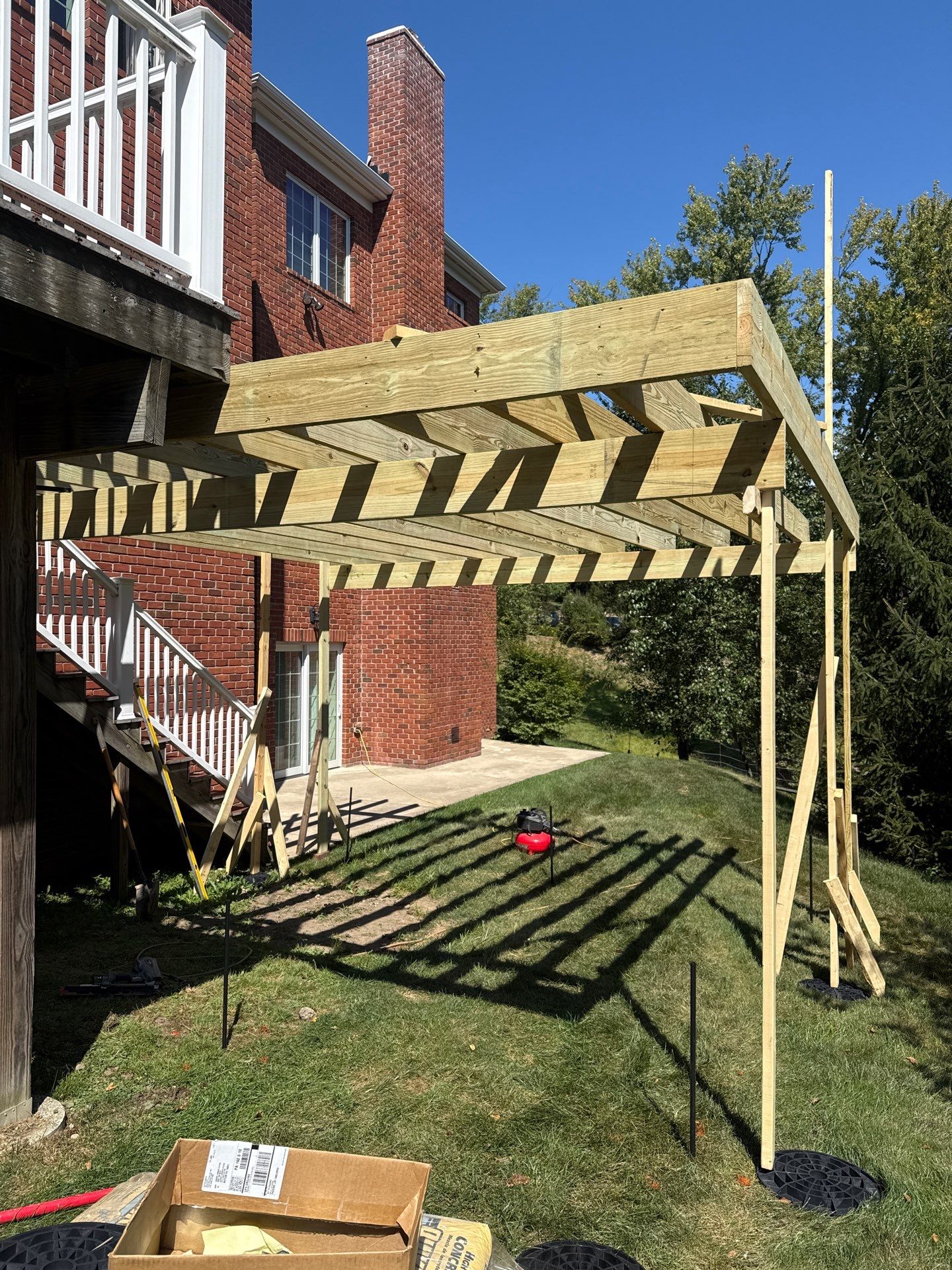 Deck extension  by Cousins Roofing Siding & Decks