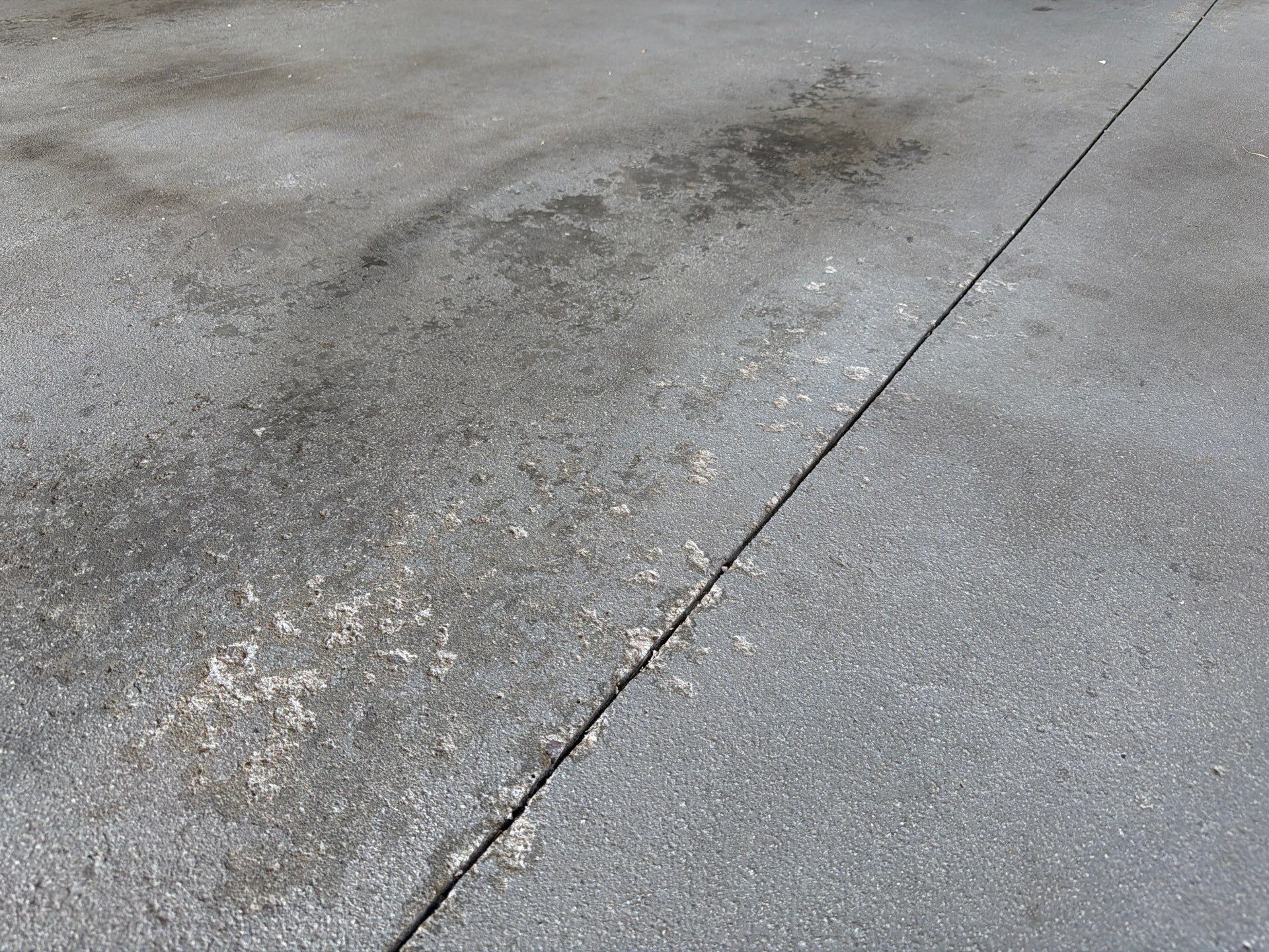 Sioux Falls Garage Floor Coating with Nightfall Decorative Chips by Select Painting, Coatings & Garage Cabinets