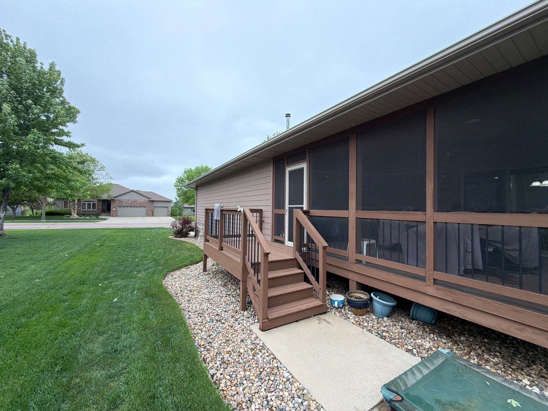 Exterior Painting and Wooden Deck Staining in Sioux Falls by Select Painting, Coatings & Garage Cabinets