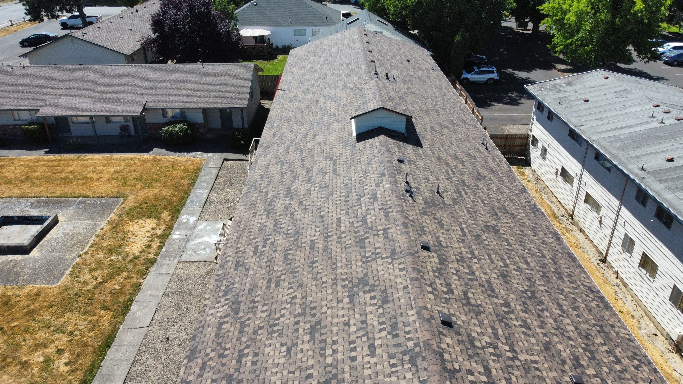 Residential Roofing Installation using IKO Dynasty (Color: Brownstone) by Orezona Building & Roofing Company, Inc.