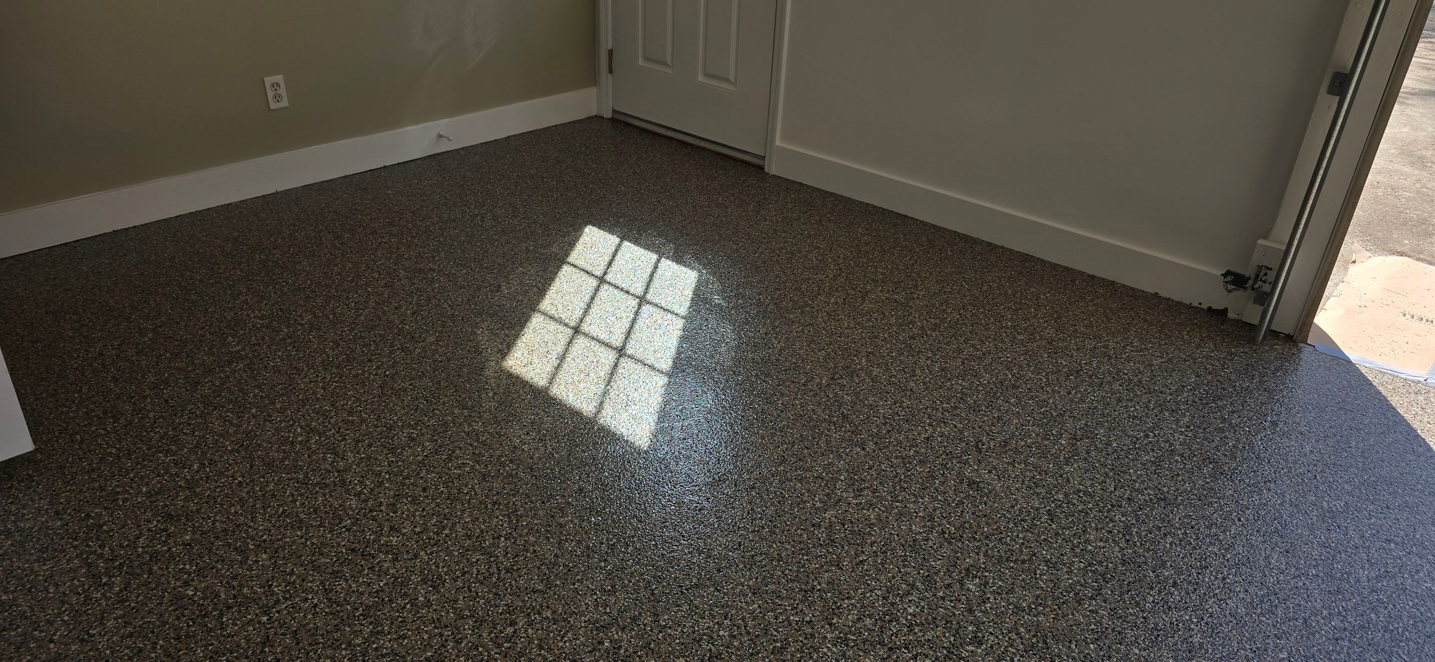 Garage Upgrade Using Custom Creekbed Blend by Elite Floor Solutions
