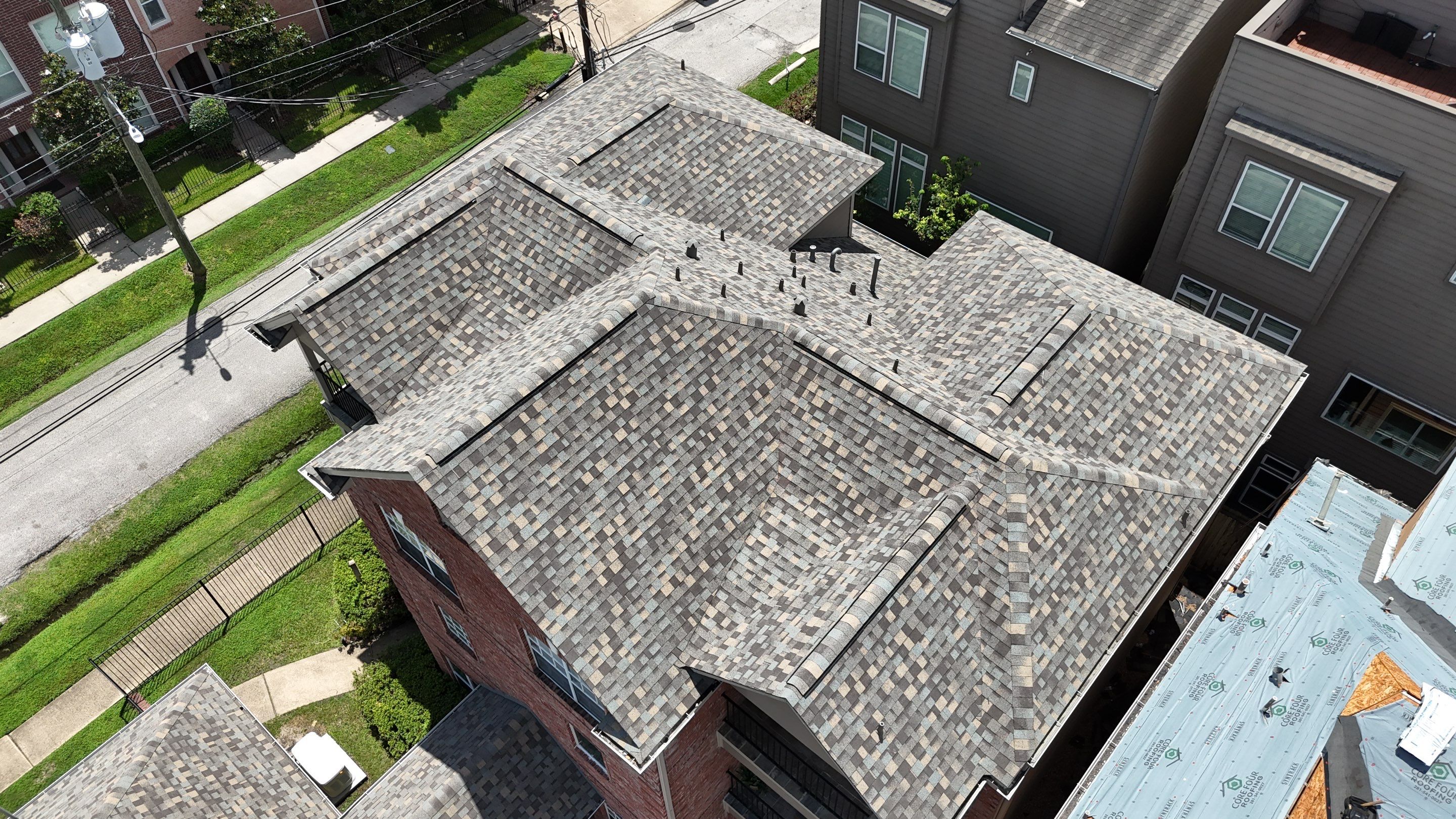 Residential Roofing Installation on a Highrise Duplex using IKO Dynasty by Core Four Roofing