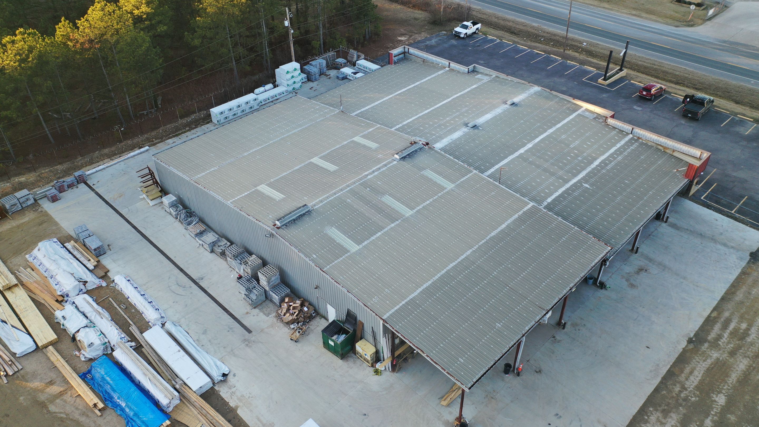 Commercial Roofing Installation using Aldocoat Coatings by Hostetler Roofing