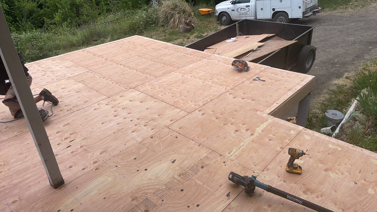 Residential Deck Replacement using Dec-Tec Membrane Color: Grafton by Orezona Building & Roofing Company, Inc.