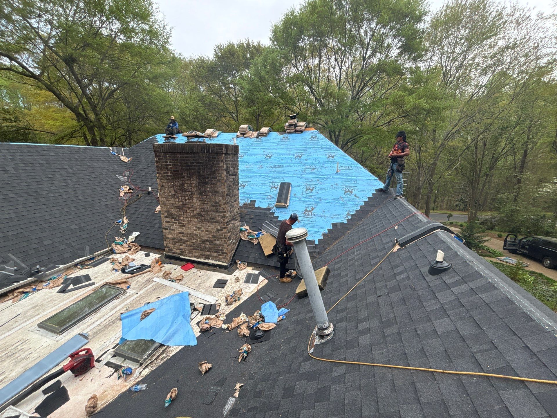 Spartanburg Residential Roof Replacement with Architectural Shingles and Skylights by Roofers LLC