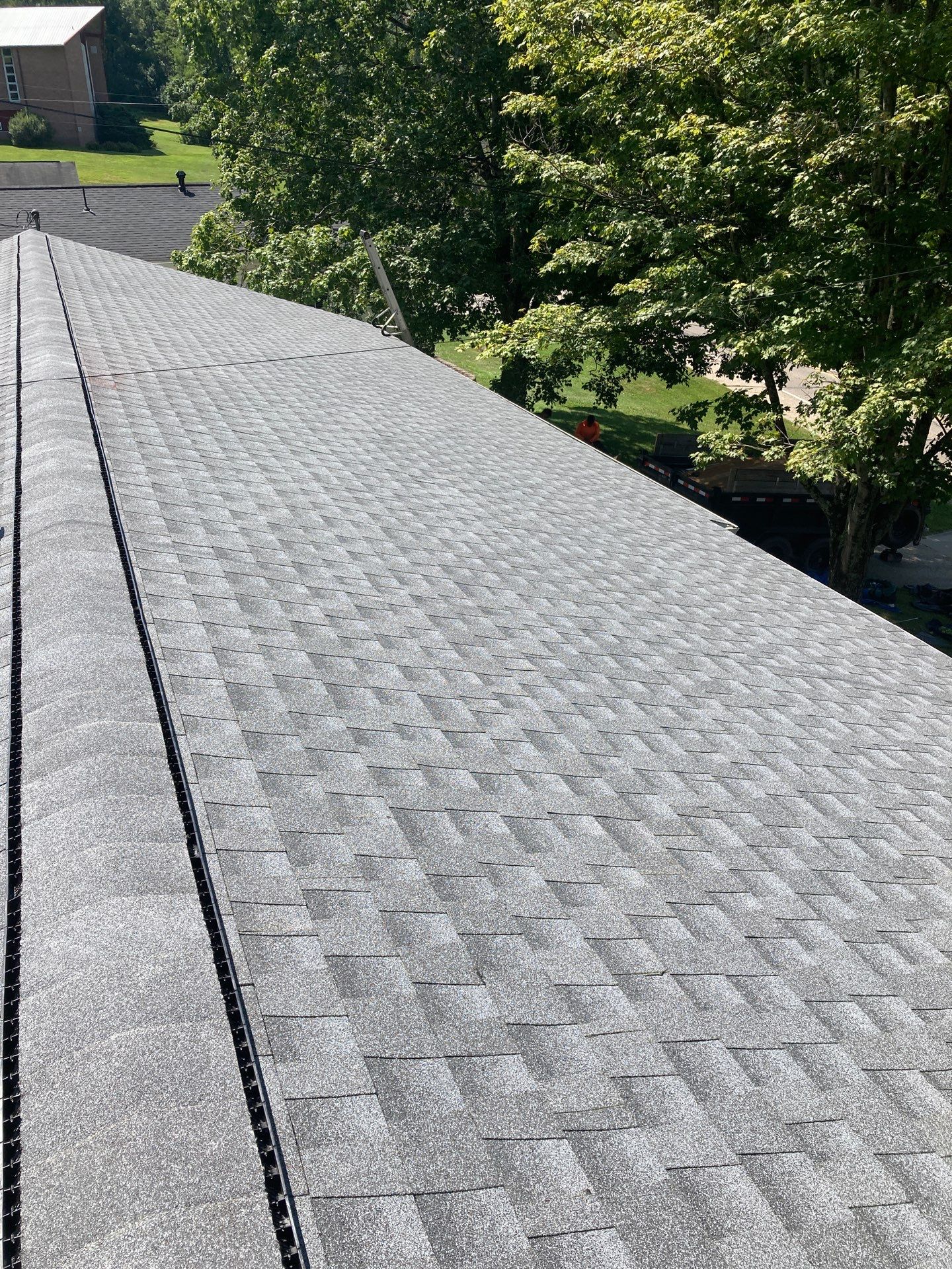 Residential Roofing Installation using GAF Timberline HDZ Oyster Grey by Rainstoppers Roofing