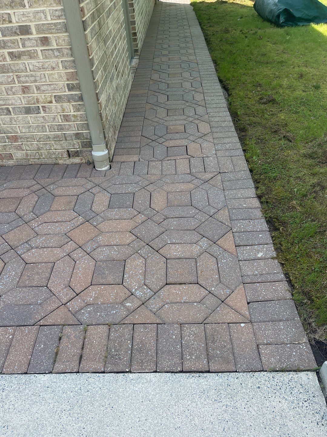 Pavers Cleaned, Garage and Concrete walls by SJ Exterior