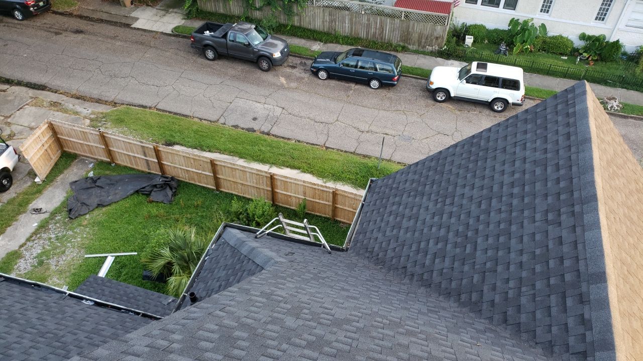 Residential Roofing Installation using Roof Replacement by American Roofing & Construction LLC