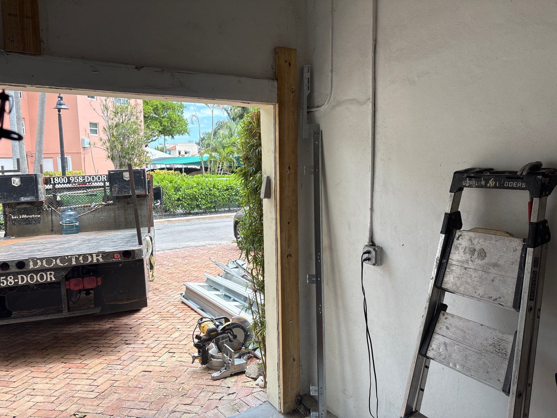 Clopay Modern Steel Garage Door Installation in Fort Lauderdale by The Door Doctor of South Florida, Inc.