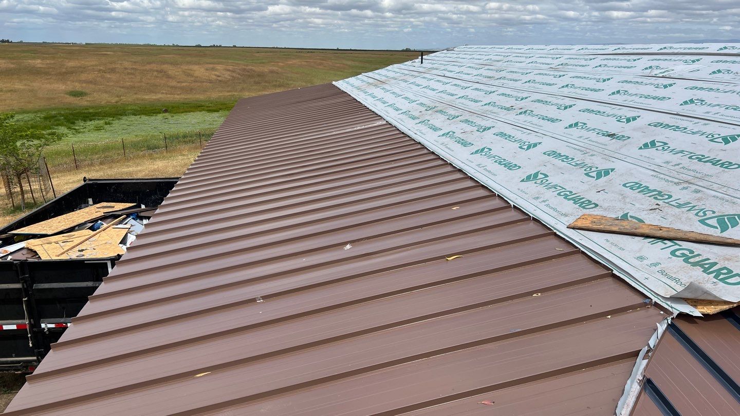 Metal roofing installation using Standing seam metal roofing system by Straight Edge Roofing Inc