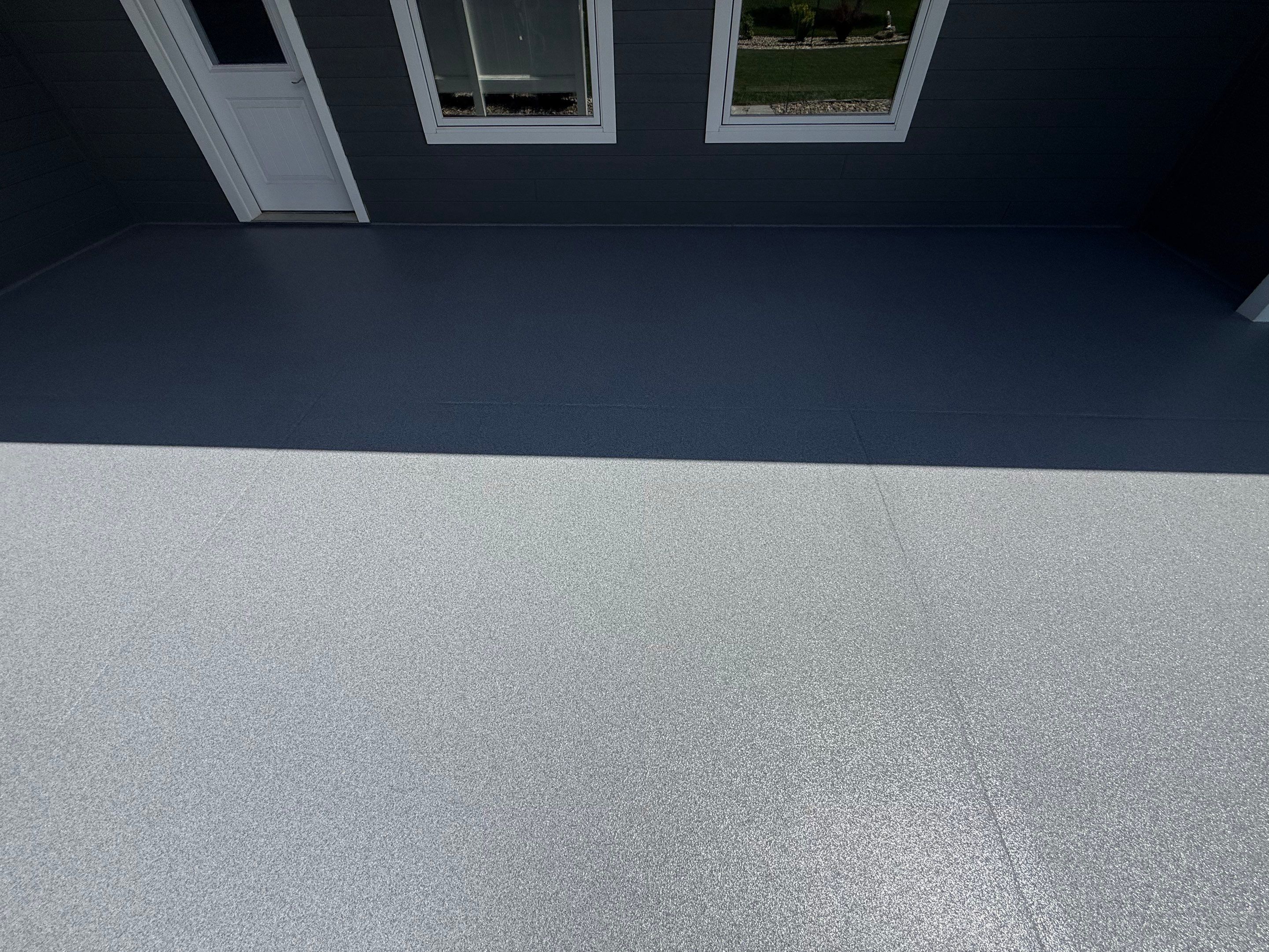 Polyurea Patio Floor Coating in Starry Evening for Sioux Falls Home by Select Painting, Coatings & Garage Cabinets