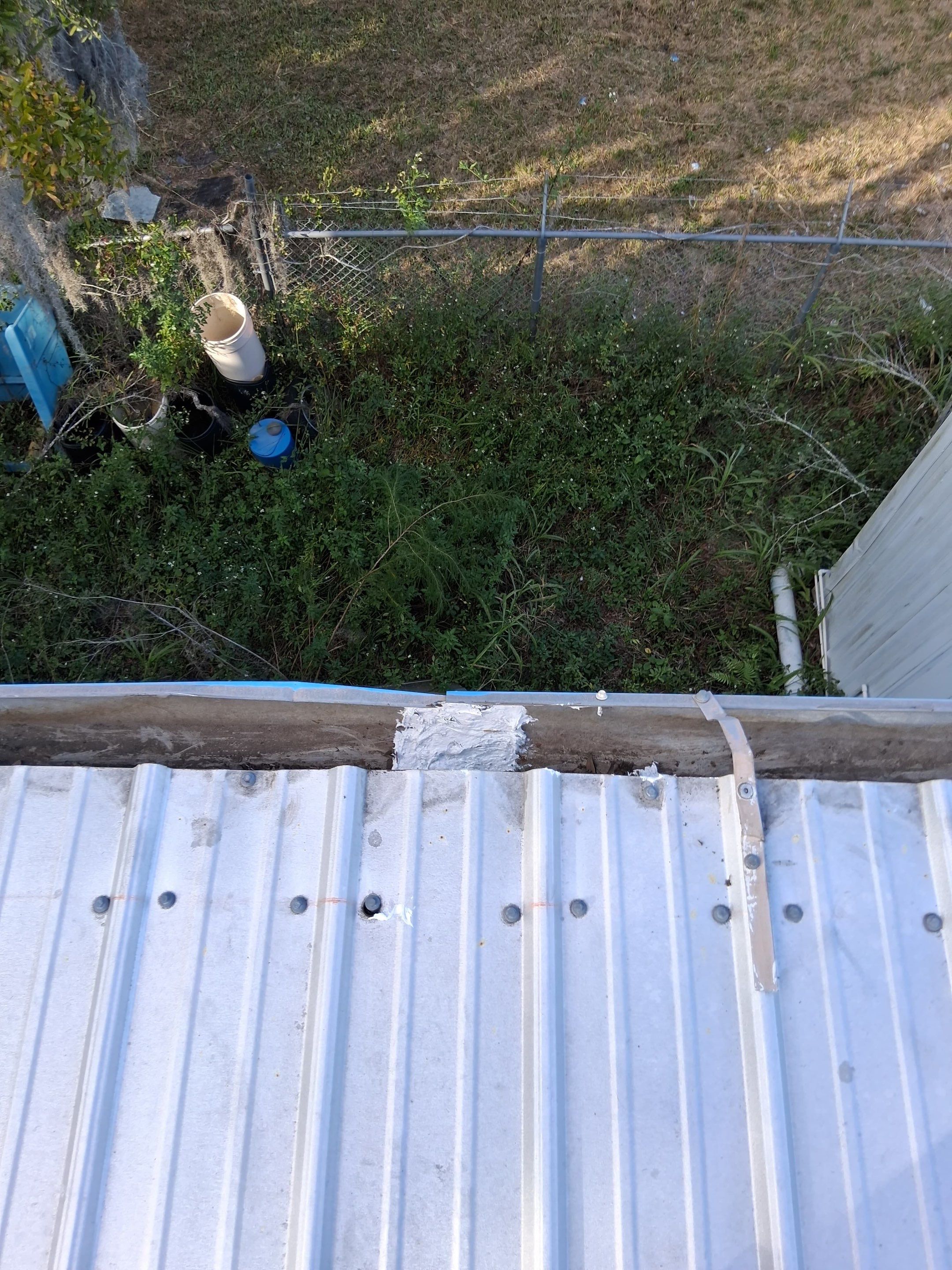 Clean Gutters and Seal Seams in Lakeland FL by Gutter Professors
