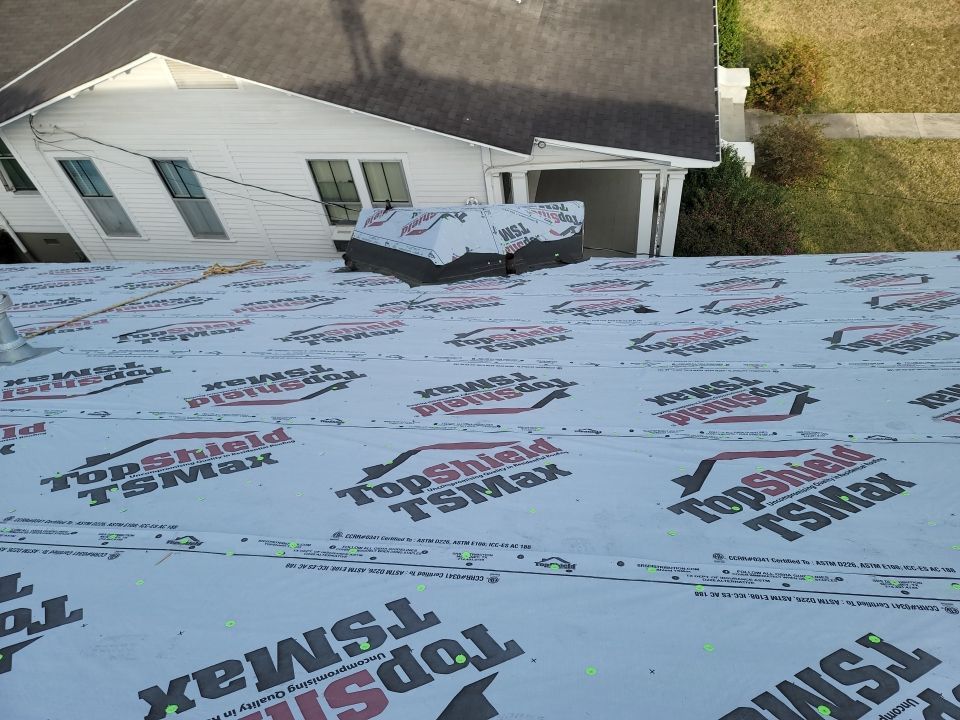 Residential Roofing Installation using Roof Replacement by American Roofing & Construction LLC