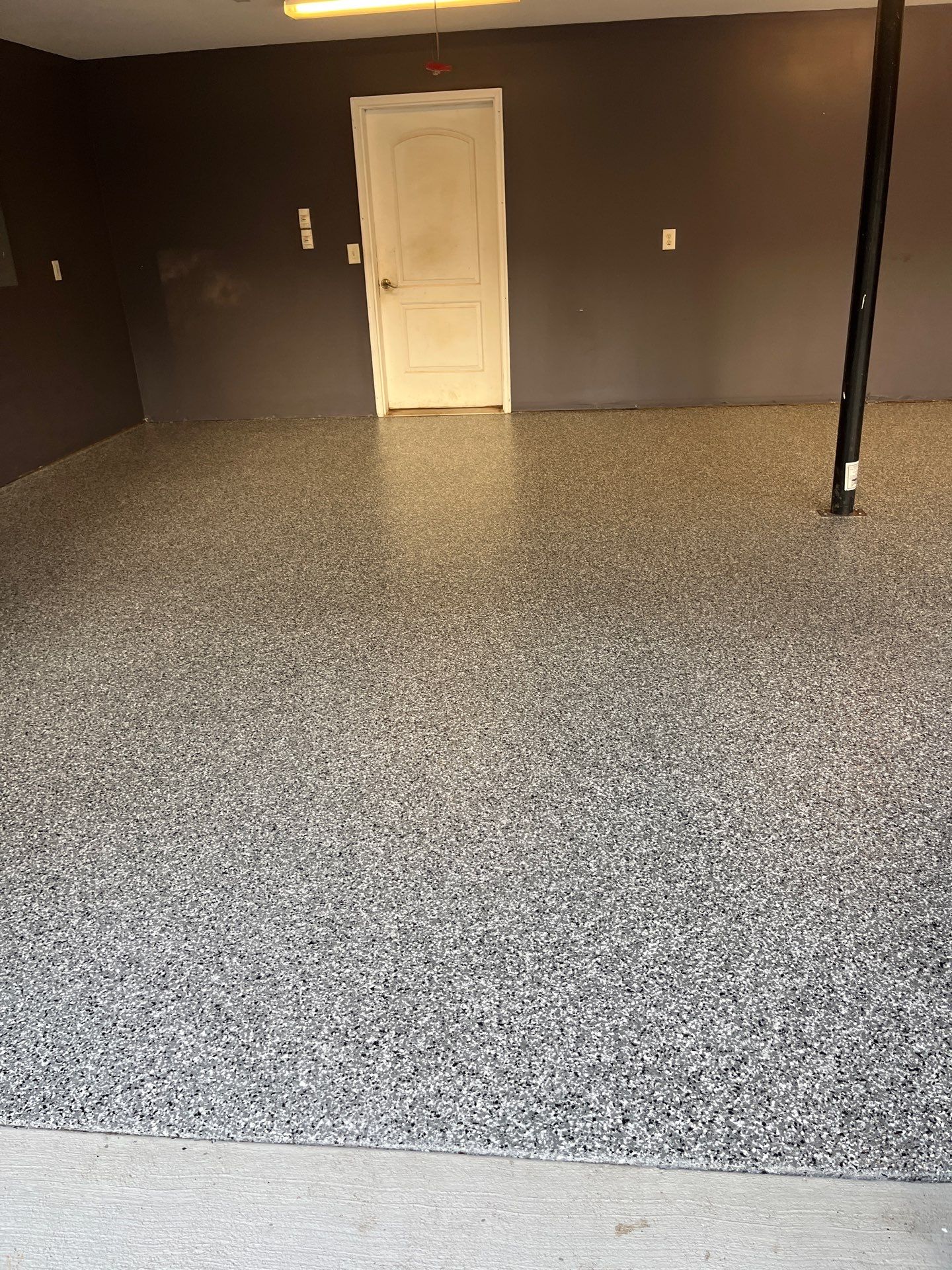 Garage Floor Coating using Wombat by My Garage Floor Guys