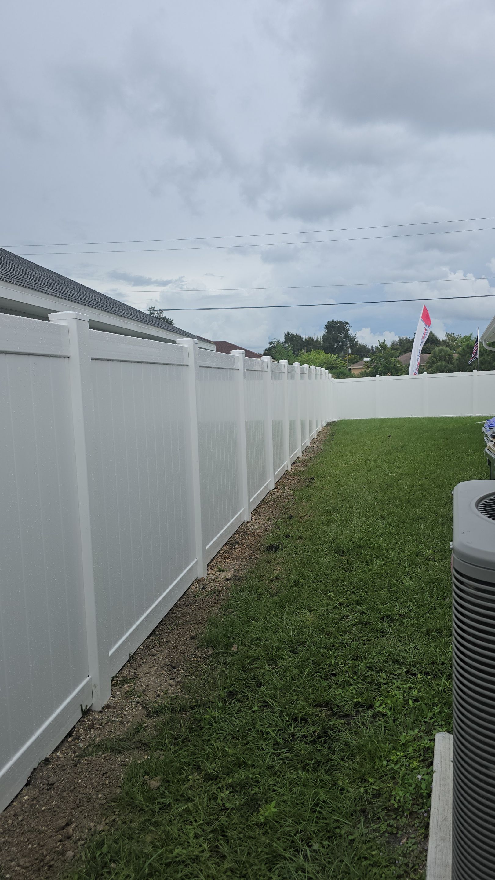 White Vinyl Privacy Fence Installation for North Port Residence by True Fence LLC