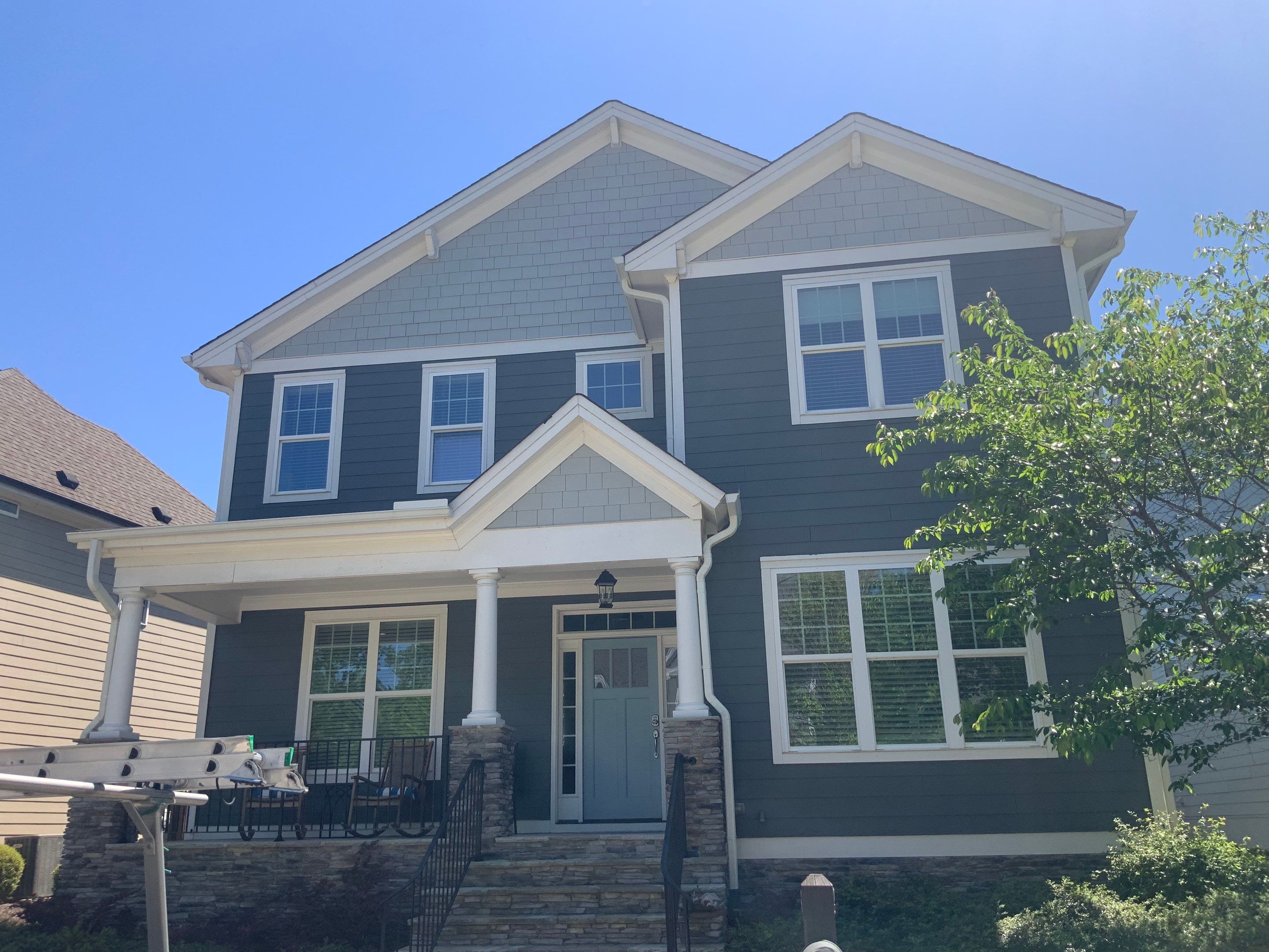 Siding replacement and exterior painting by GonzalezPainters & Contractors Inc