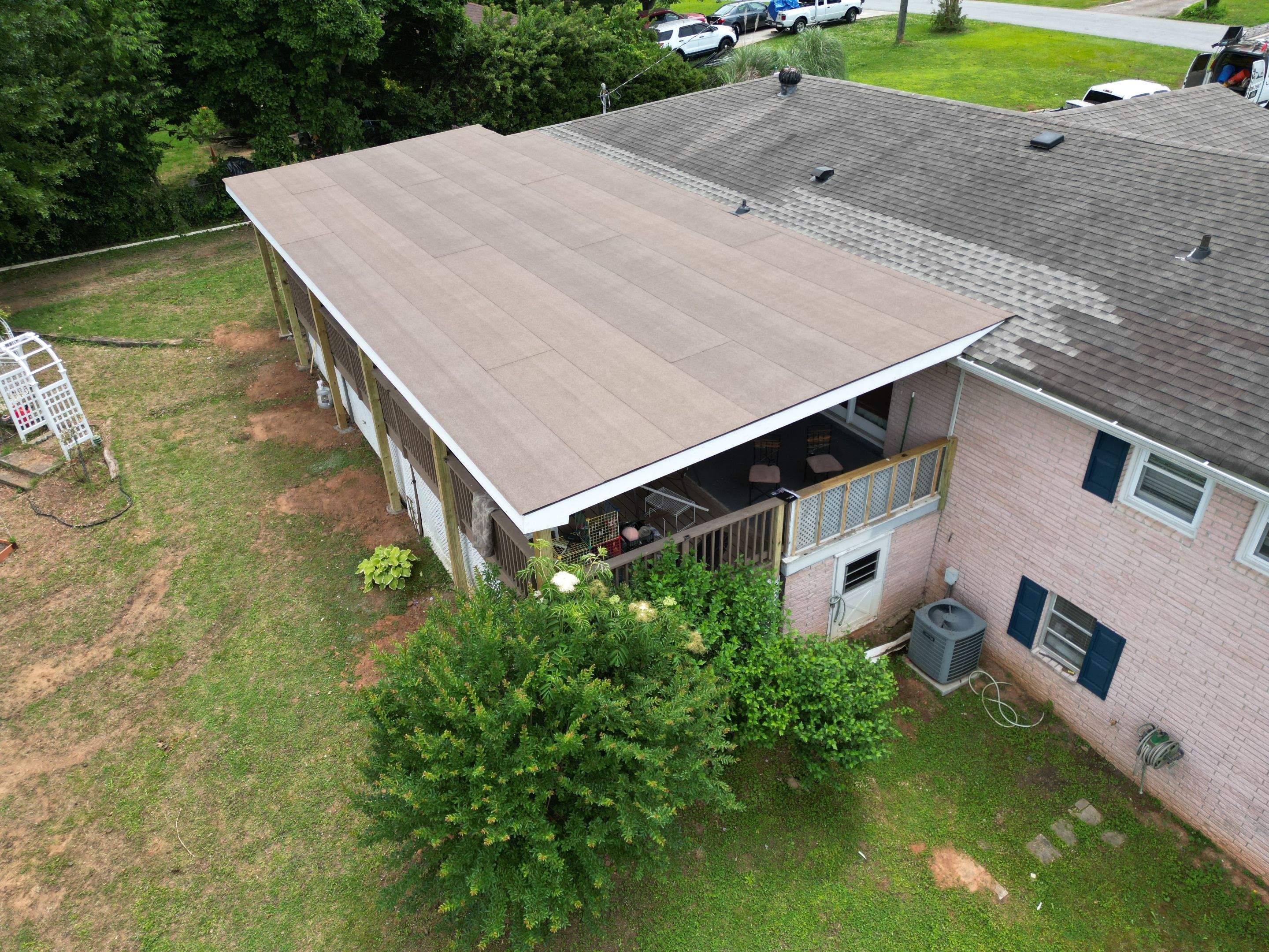 Cover porch by Deerfield Roofing LLC