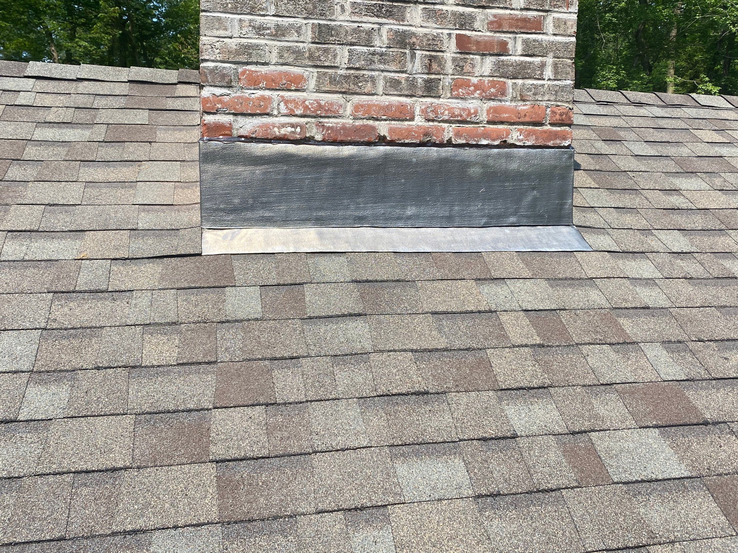 Commercial Roofing Installation using Owens Corning Duration Driftwood by A Plus Exterior