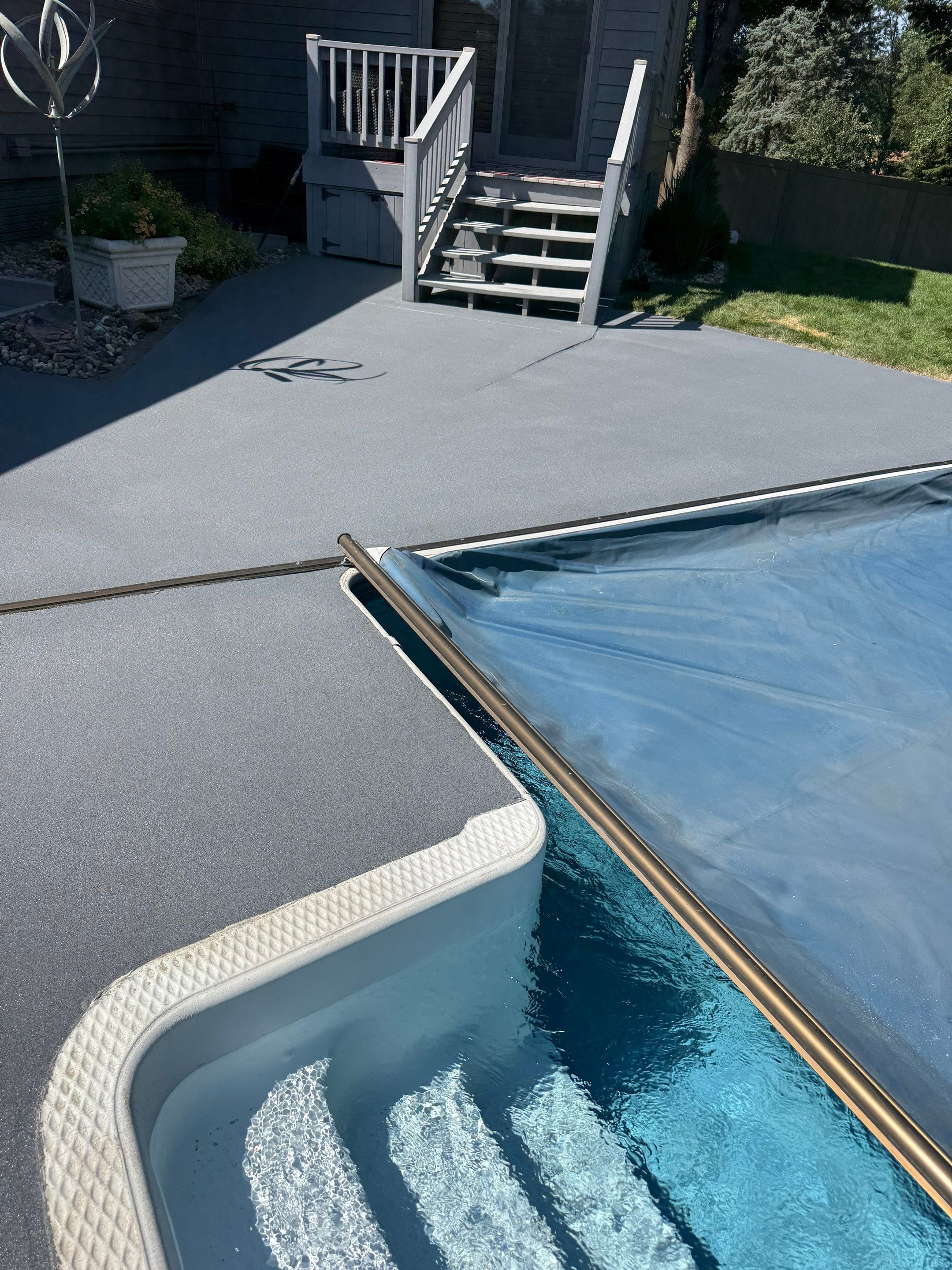 Residential Pool Deck Resurfacing in Sioux Falls by Select Painting, Coatings & Garage Cabinets