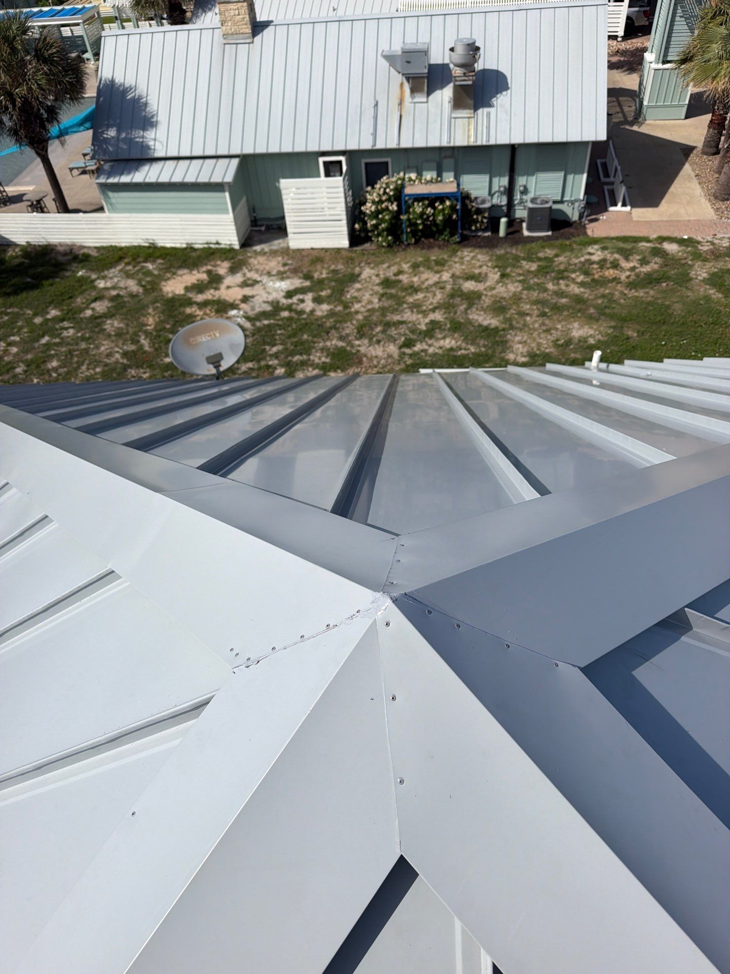 Residential Roof Replacement using 24 GA Double-Lock - Match Dove Grey by Action Exteriors Austin