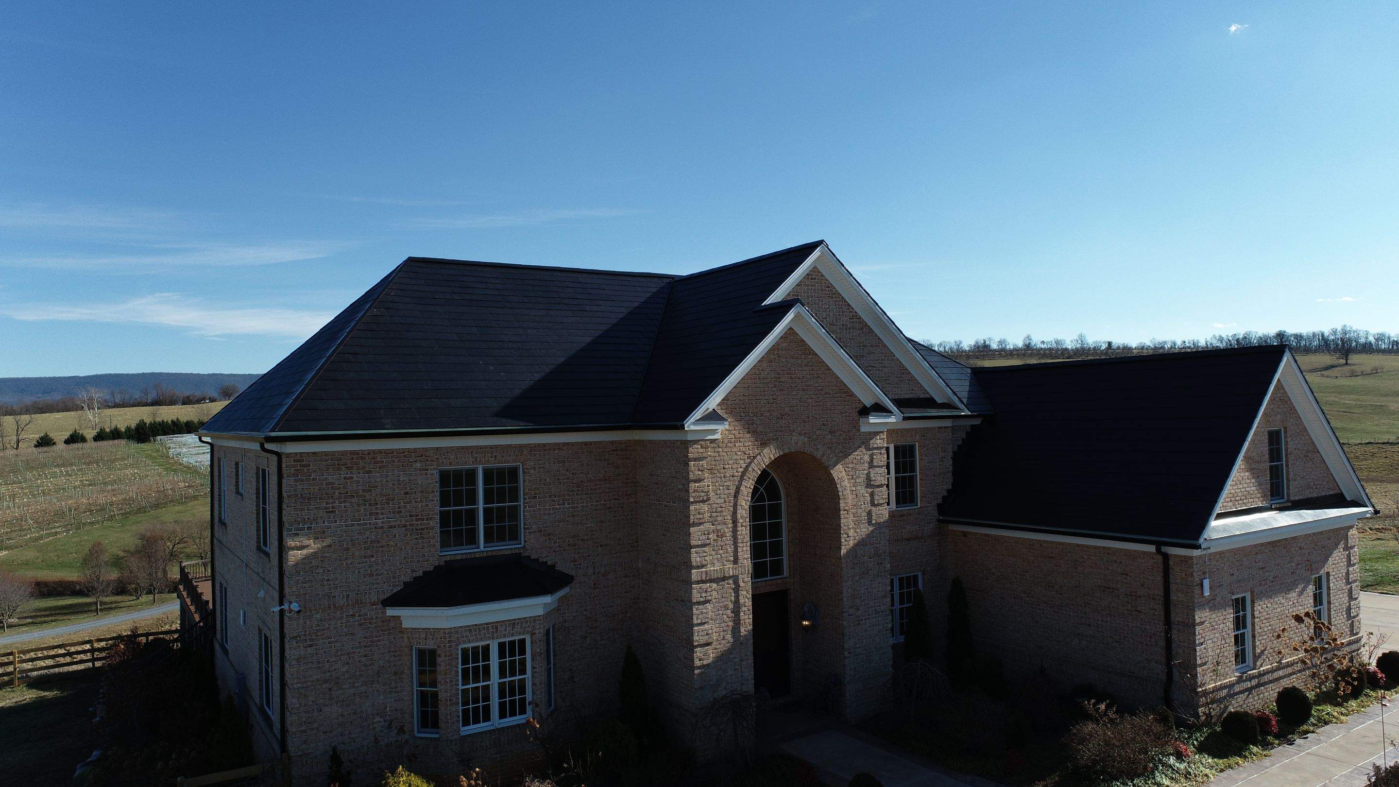 Tesla Solar Roof Replacement  by American Home Contractors