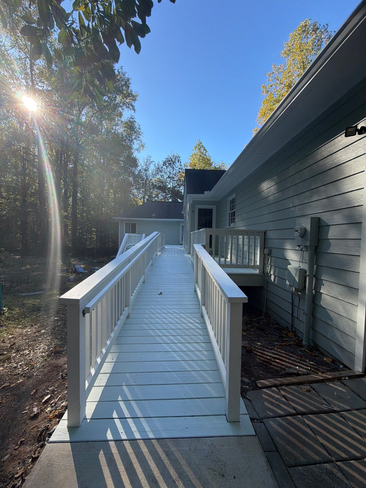 Exterior Residential Painting and Deck Refinishing in Canton, Georgia by Swift Home Renovations 